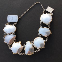 Toshikane Seven Lucky Gods Bracelet. Porcelain and Silver. 1940's.