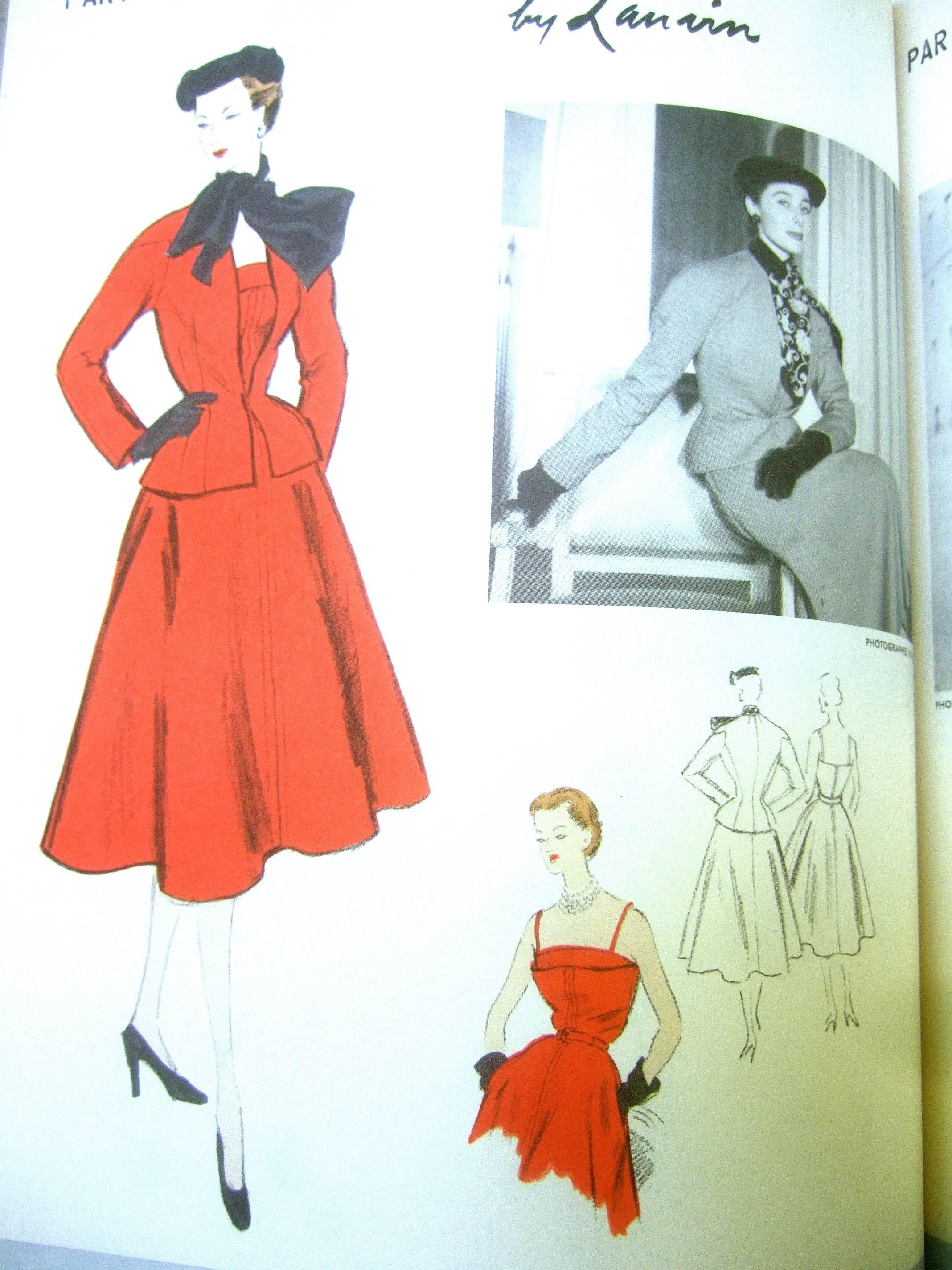 1952 Vogue pattern book with French couture illustrations
The large scale hard bound book is a snap shot of beautiful
illustrated patterns of chic well dressed mid century woman 

Some of the elegant pattern illustrated designs are