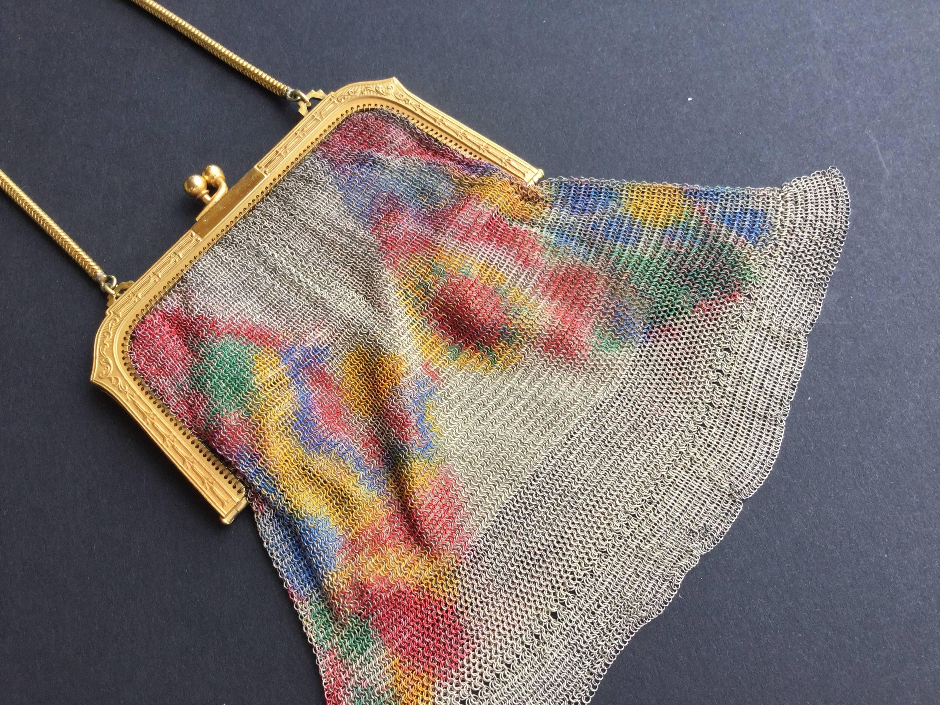 Impressionistic 1920's Dresden Mesh bag. Totally Flapper style. Think Daisy in The Great Gatsby! Painted, incredibly fine, knitted chainmail metal mesh in muted palette of red, blue, yellow, and green. Gilded decorated frame. Suspended from a