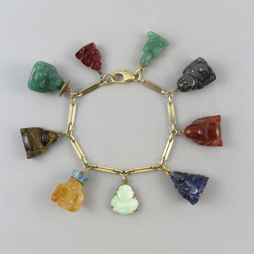 Fabulous Charm Bracelet of Carved Gemstone Buddhas. 1960's. In Excellent Condition In University City, MO