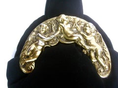 Ornate Brass Metal Cherub Emblem Black Cloth Evening Bag c 1950s