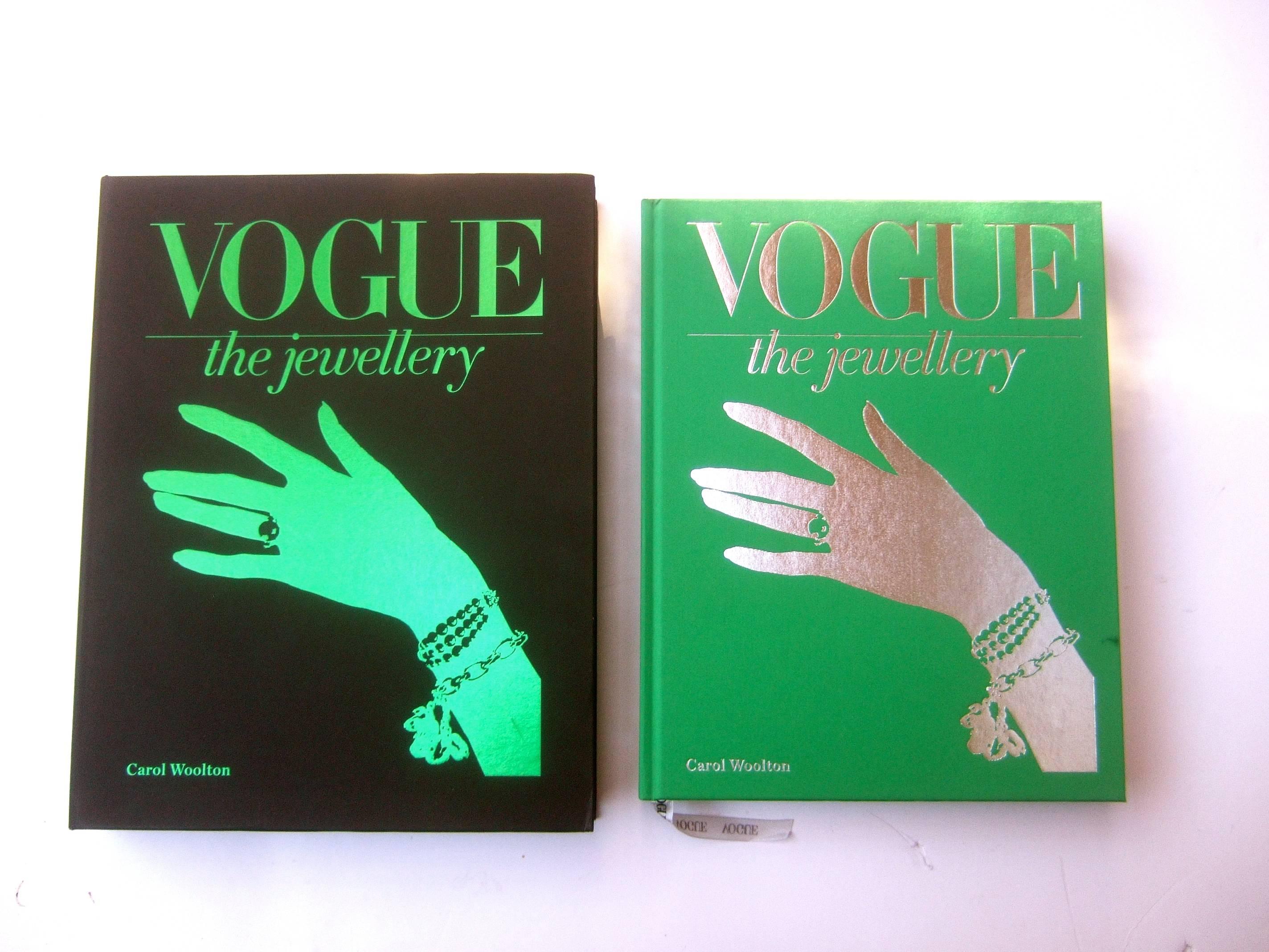 Vogue The Jewellry Hard book in the presentation box by Carol Woolton
The comprehensive book is an archive of Vogue's 20th century 
photographers; featuring a vast assortment of celebrities adorned
with an array of jewelry from the worlds preeminent