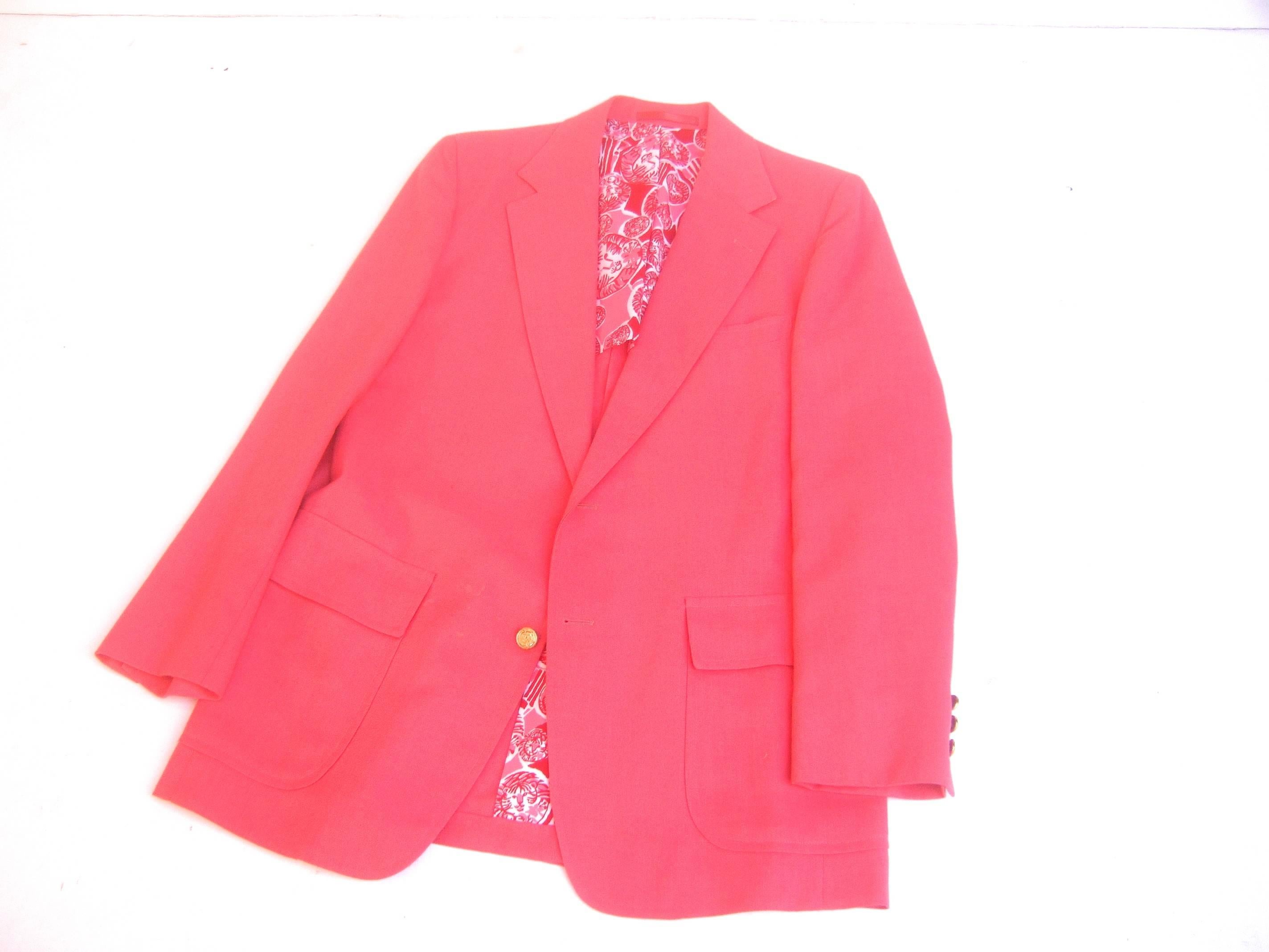 Men's Lilly Pulitzer coral pink resort sports jacket c 1970s
The resort style jacket is partially lined in her 
whimsical tiger print fabric in red and pink

The stylish preppy resort jacket is adorned 
with gilt metal buttons with a tiger head