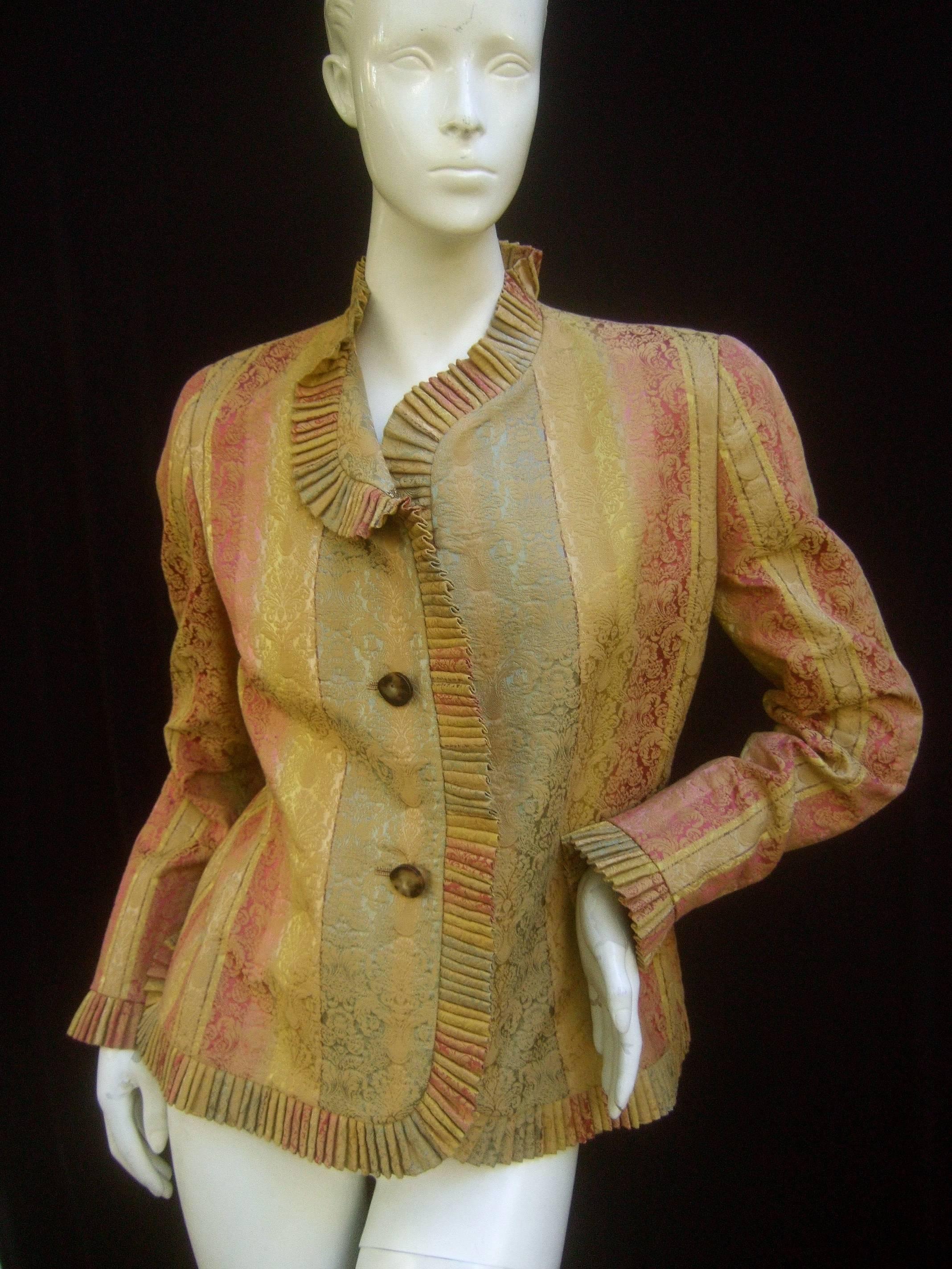 Bill Blass Striped brocade ruffled trim jacket for Saks Fifth Avenue 
The stylish designer jacket is framed with a pleated border 
that circles the neckline, runs down the front and frames 
the cuffs 

The tapestry brocade fabric is designed with