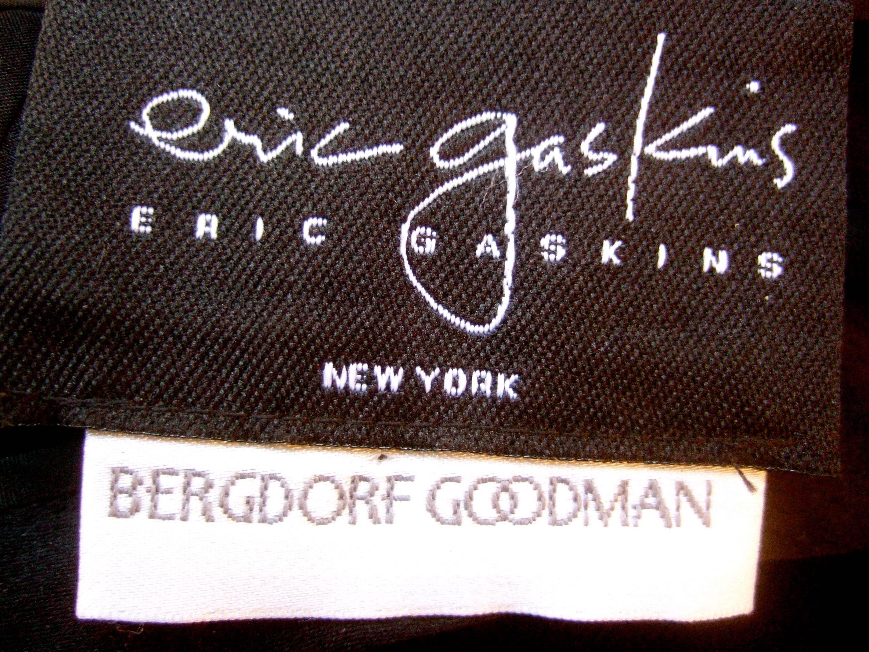 Black long silk velvet maxi skirt from Bergdorf Goodman by Eric Gaskins 
The elegant silk velvet maxi skirt has a luminous silvery sheen 
The luxurious textured fabric is plush and soft 

A thin black satin band circles the waistline 
Lined in black