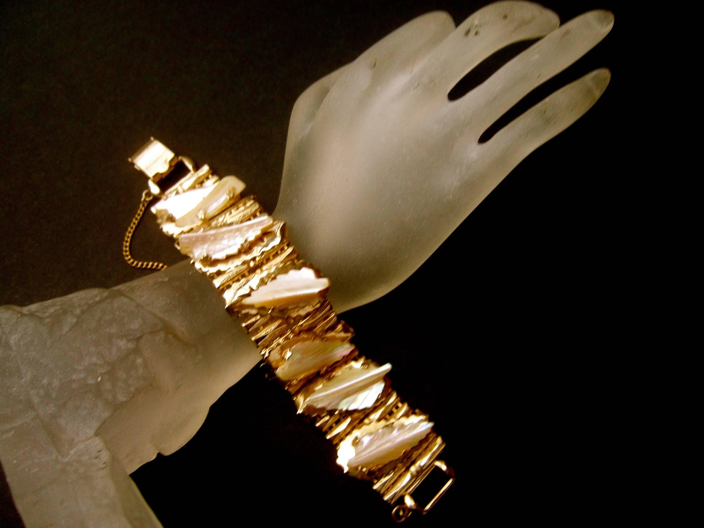 Kafin New York Carved Mother of Pearl Gilt Metal Link Bracelet circa 1960s In Good Condition For Sale In University City, MO