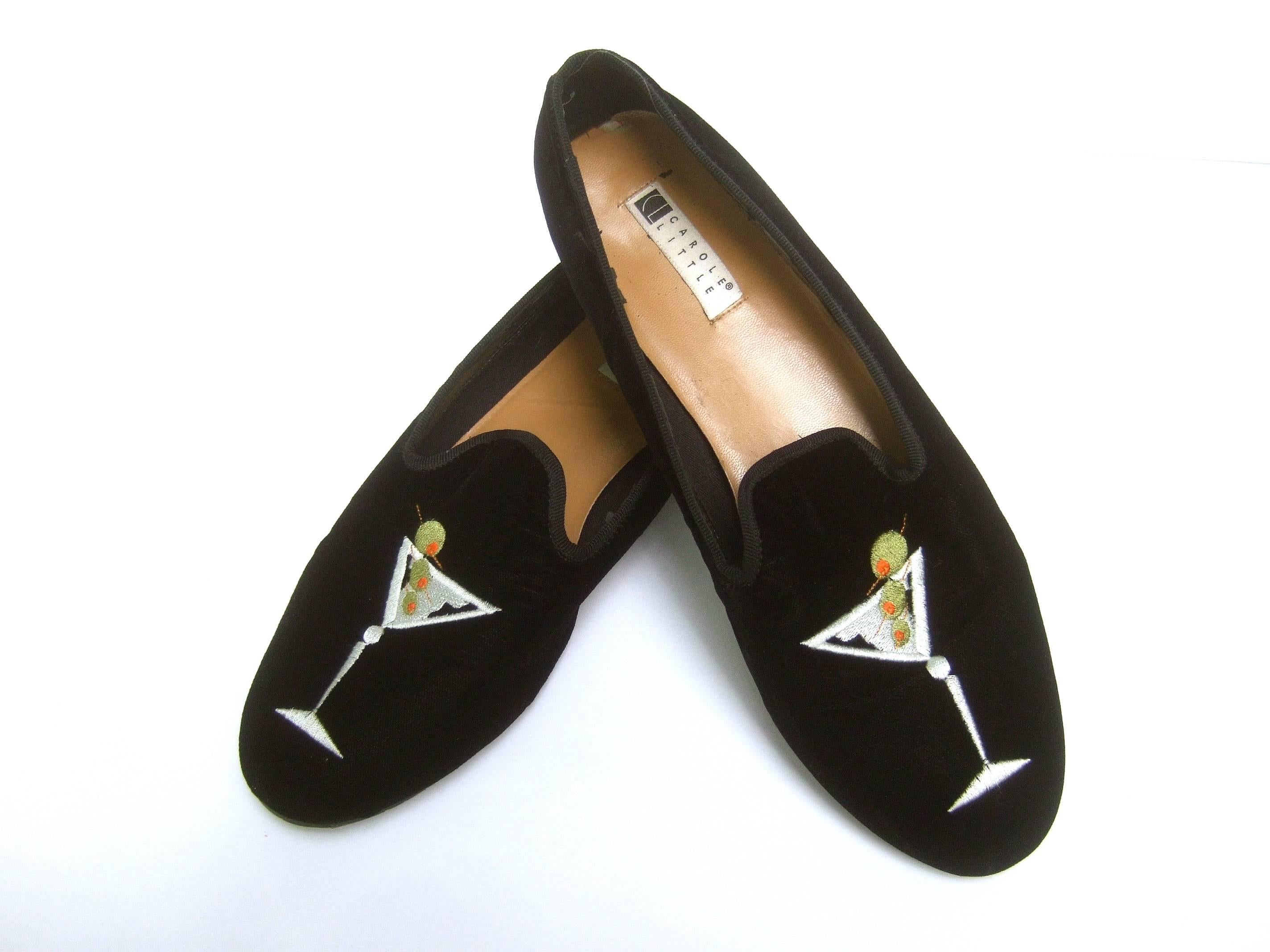 Black velvet embroidered martini glass women's shoes US Size 10 M 
The stylish slipper style shoes are covered with plush black velvet 
Each shoe is designed with an embroidered martini glass 

The interior soles are tan leather designed by Carole