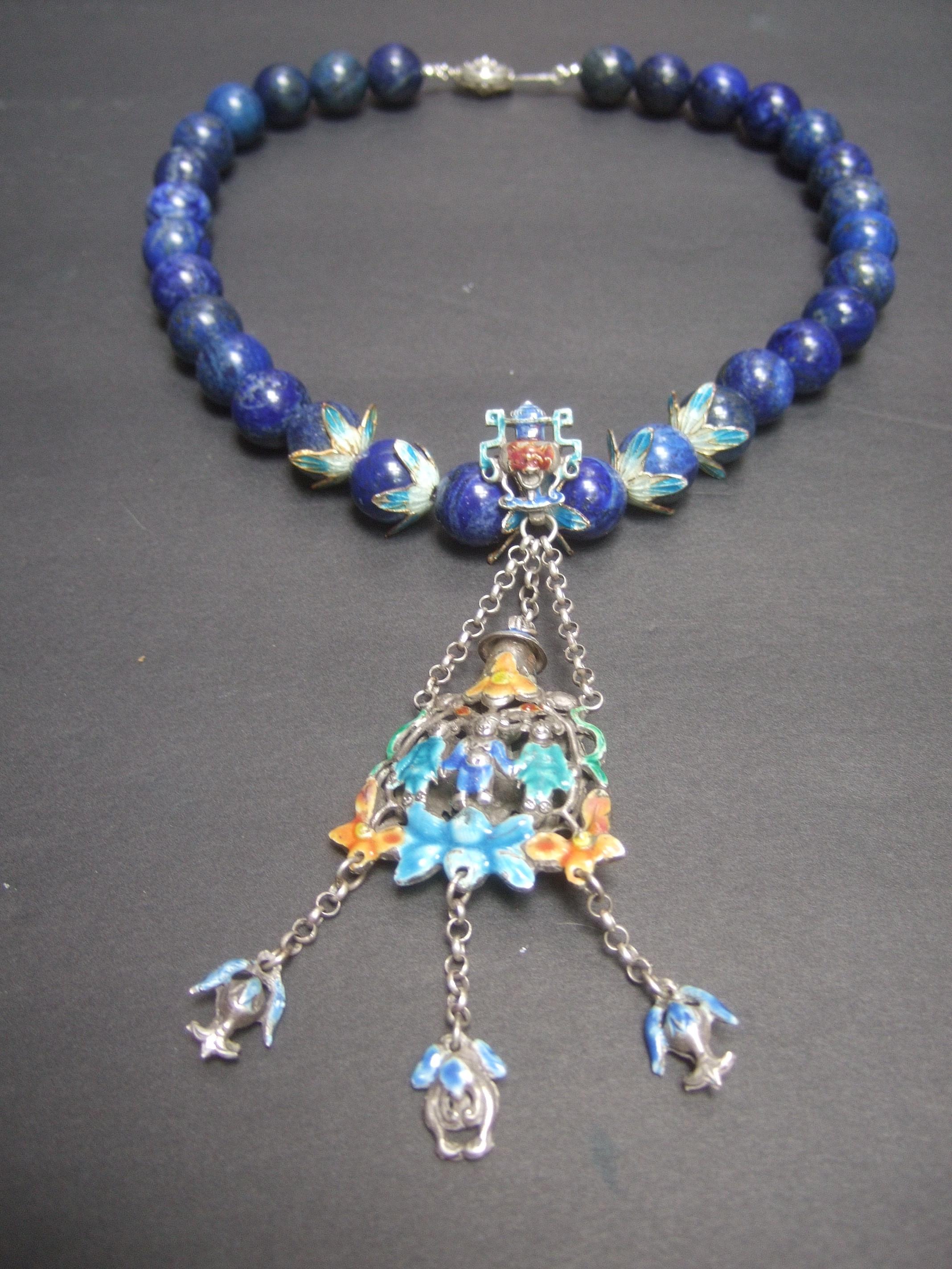 Exquisite Chinese sterling Lapis figural enamel necklace c 1930s
The fabulous Chinese sterling necklace merges two
extraordinary designs into one incredible artisan creation 

The beautiful carved enamel Lapis beaded necklace  
is adorned with a