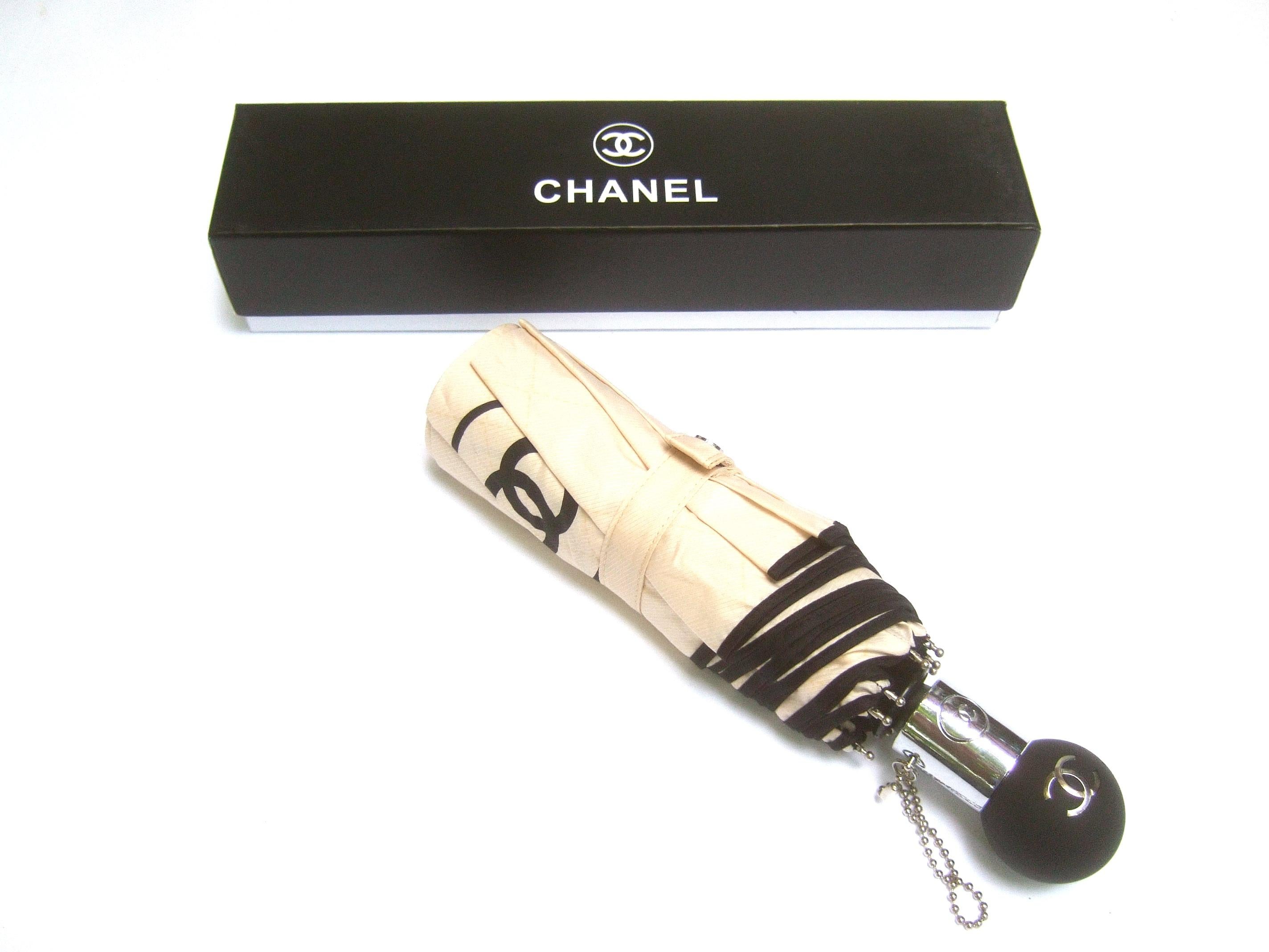 Chanel Tan & Black Nylon Umbrella in Chanel Box Circa 21st C  4