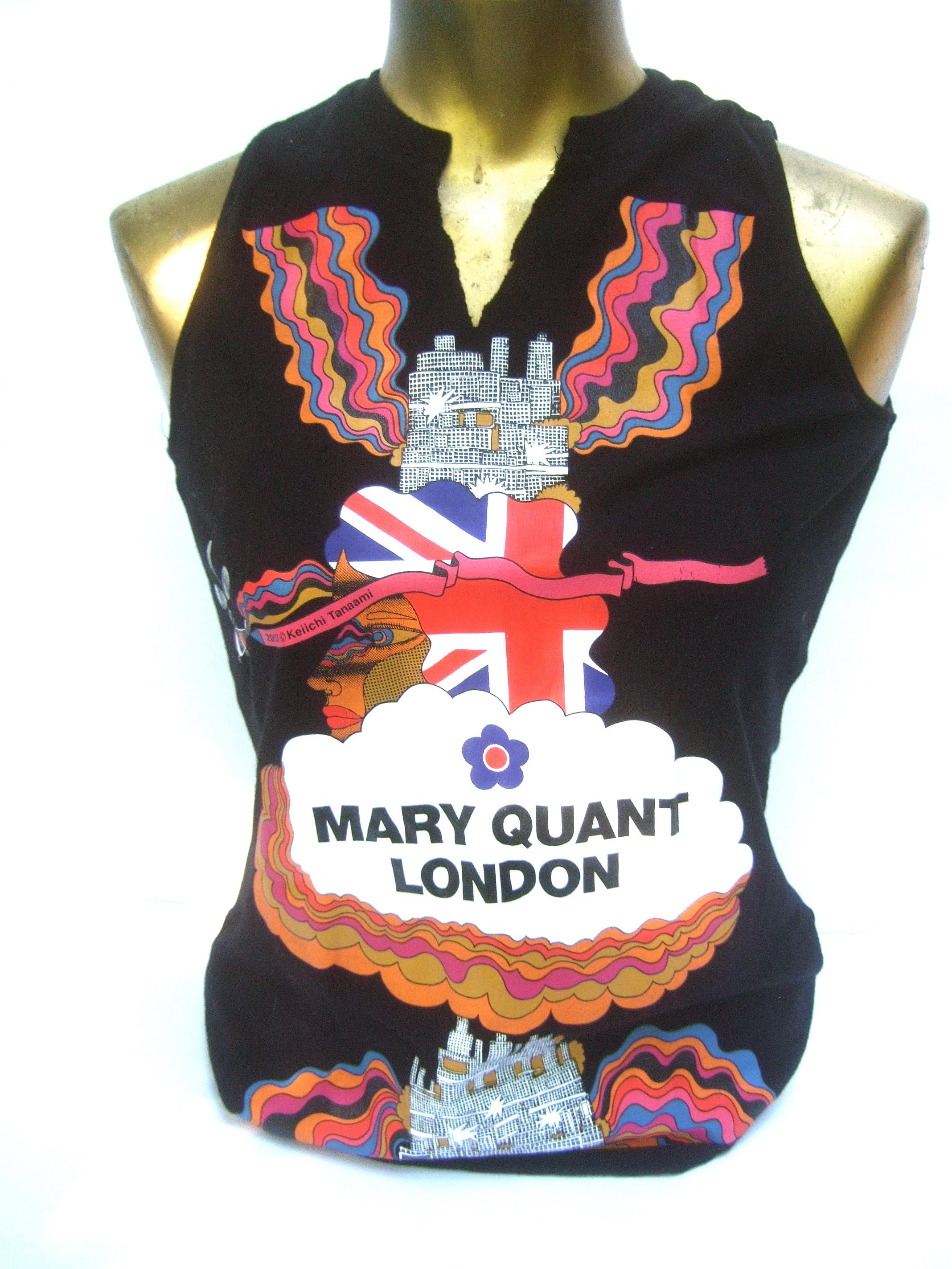 Mary Quant London black sleeveless cotton t-shirt top circa 2003
The silkscreen cotton top is illustrated with bold graphics
reminiscent of Peter Max; illuminated against a solid black
background

The center neckline has an intentional jagged street
