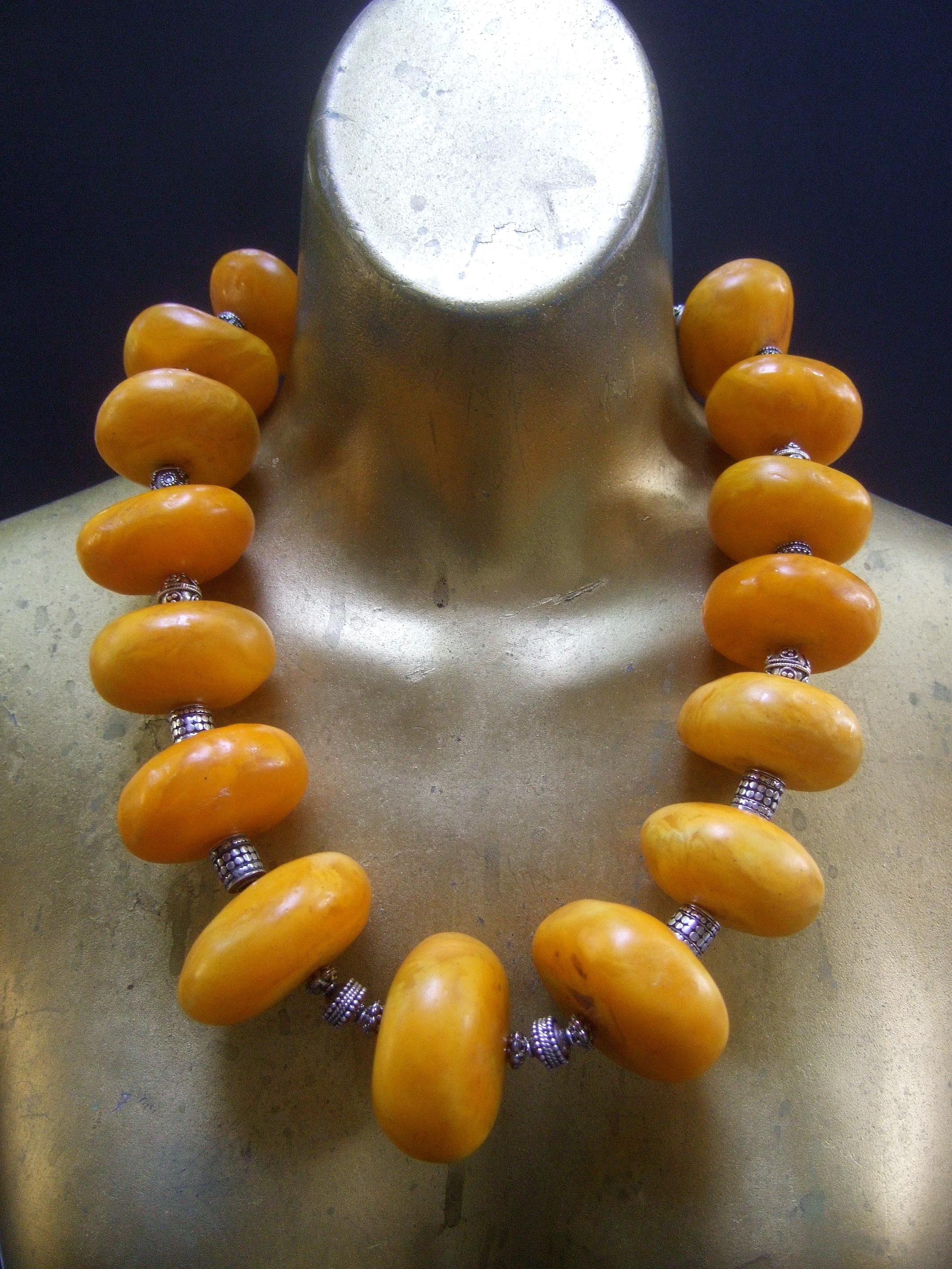 Women's Massive Faux Amber Color Resin Beaded Artisan Necklace c 1970s