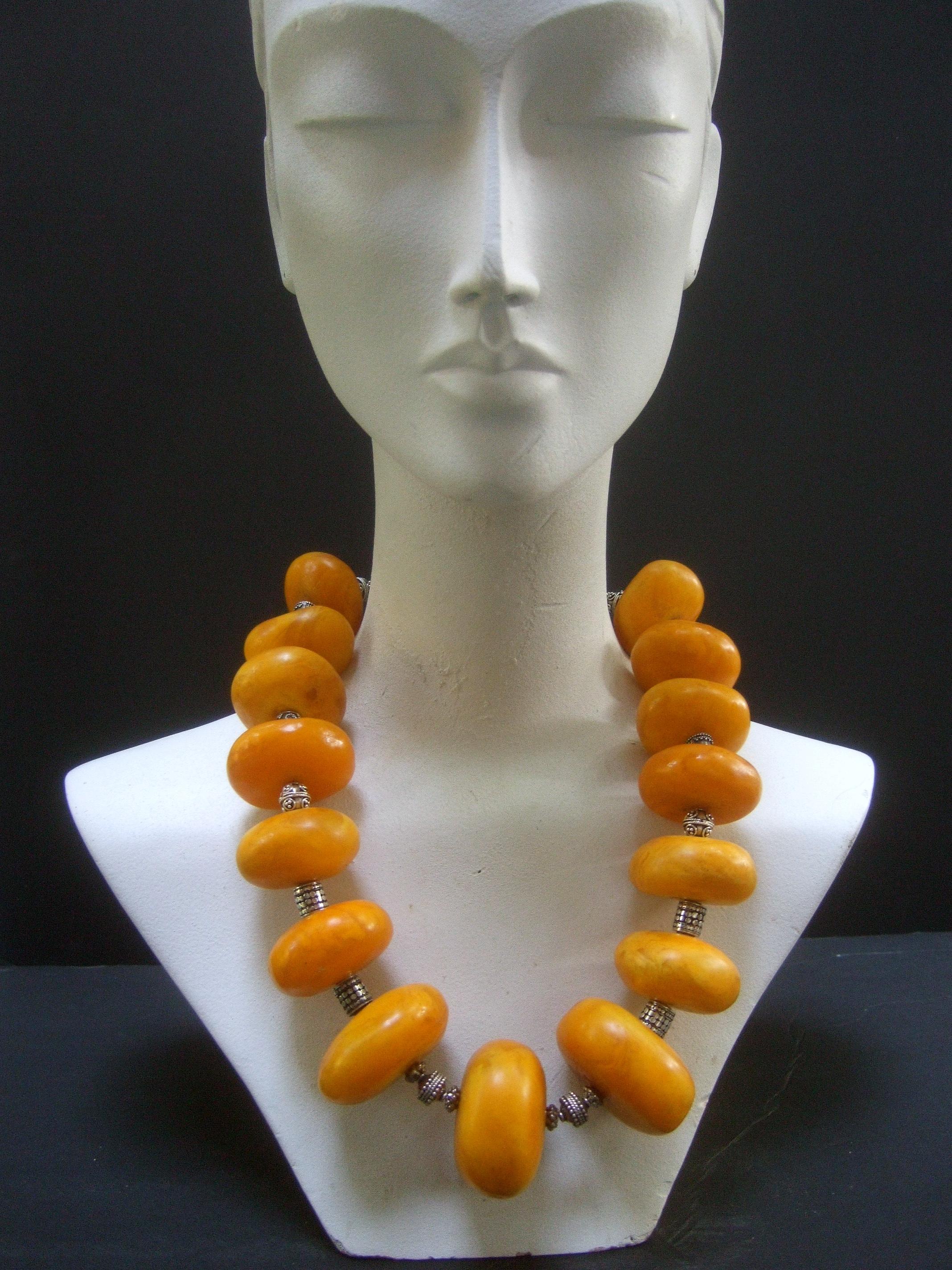 Massive Faux Amber Color Resin Beaded Artisan Necklace c 1970s In Good Condition In University City, MO