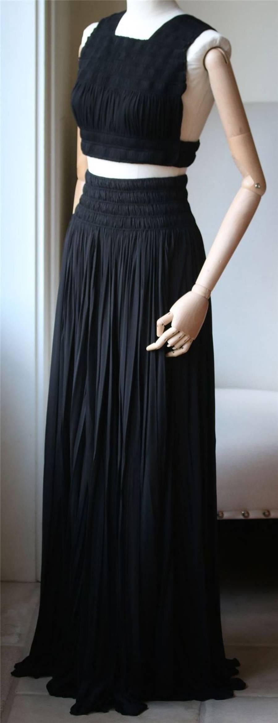 Versatile maxi skirt and top from Alaia. Ruched racerback crop top. Full length. Stretch waist with ruched detail. Pulls on. Unlined. 

Size:
Top: FR 40 (UK 12, US 8, IT 44). Comes up small.
Skirt: FR 38 (UK 10, US 6, IT 42). Comes up