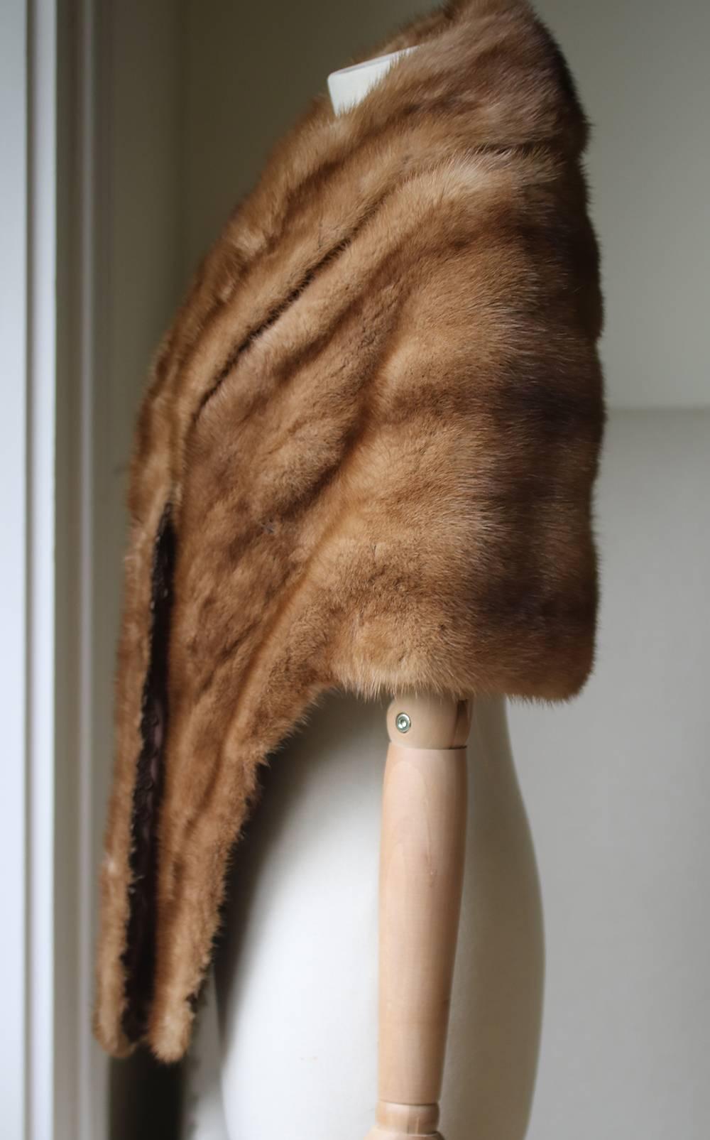 A timeless indulgence, Miu Miu's mink fur scarf marries classic and contemporary to great effect. In a classic mink shade of browns, the gradient finish and glossy silk lining make it a true investment piece.

Size: Small (UK 8, US 4, FR 36, IT