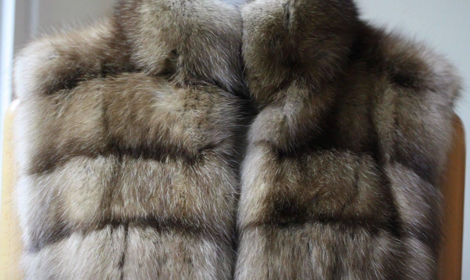 Stunning golden sable reversible fur jacket with crocodile detailing and delicate suede lining. Fur is beautifully soft. Featuring front clip fastening. Make an impact during après-ski.

Size: UK 8, US 4, IT 40, FR 36

Condition: Size label has been