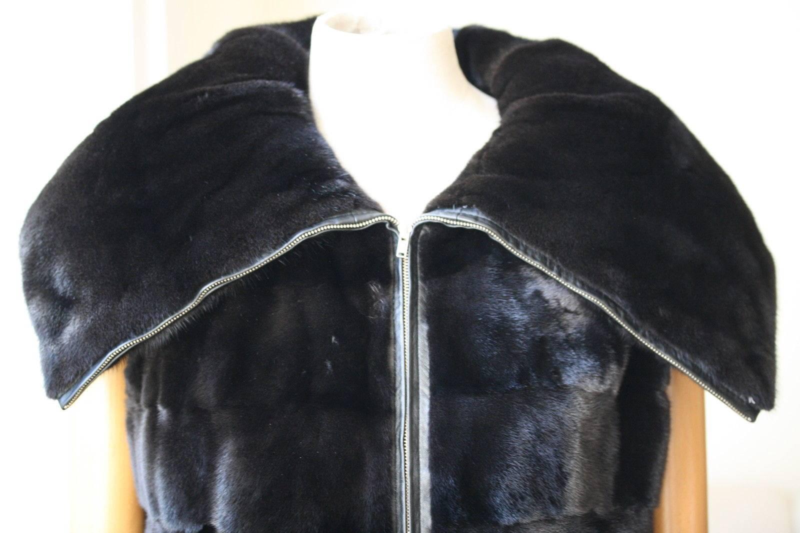 This is a lust-worthy, once-in-a-lifetime luxuriously indulgent gilet with oversized funnel collar…so Parisian. Nothing is as gorgeous as mink in a contemporary but classic design and colour. Zip up. Fully lined. 100% Mink fur.

Size: FR 38 (UK 10,