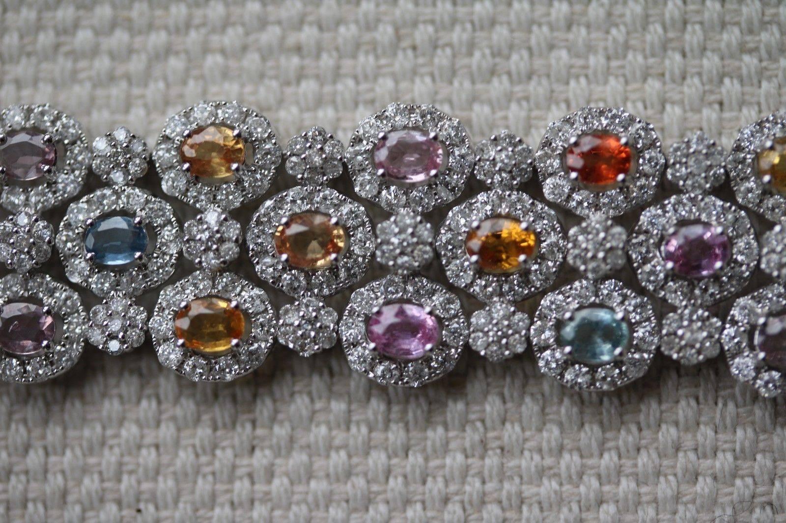 Stunningly pretty and sparkly diamond bracelet. Diamond bracelet with citrine and topaz gems. Actual designer unknown so valued as a non designer bracelet making this stunning piece particularly good value. Hallmarked 750.  Approximate diamond