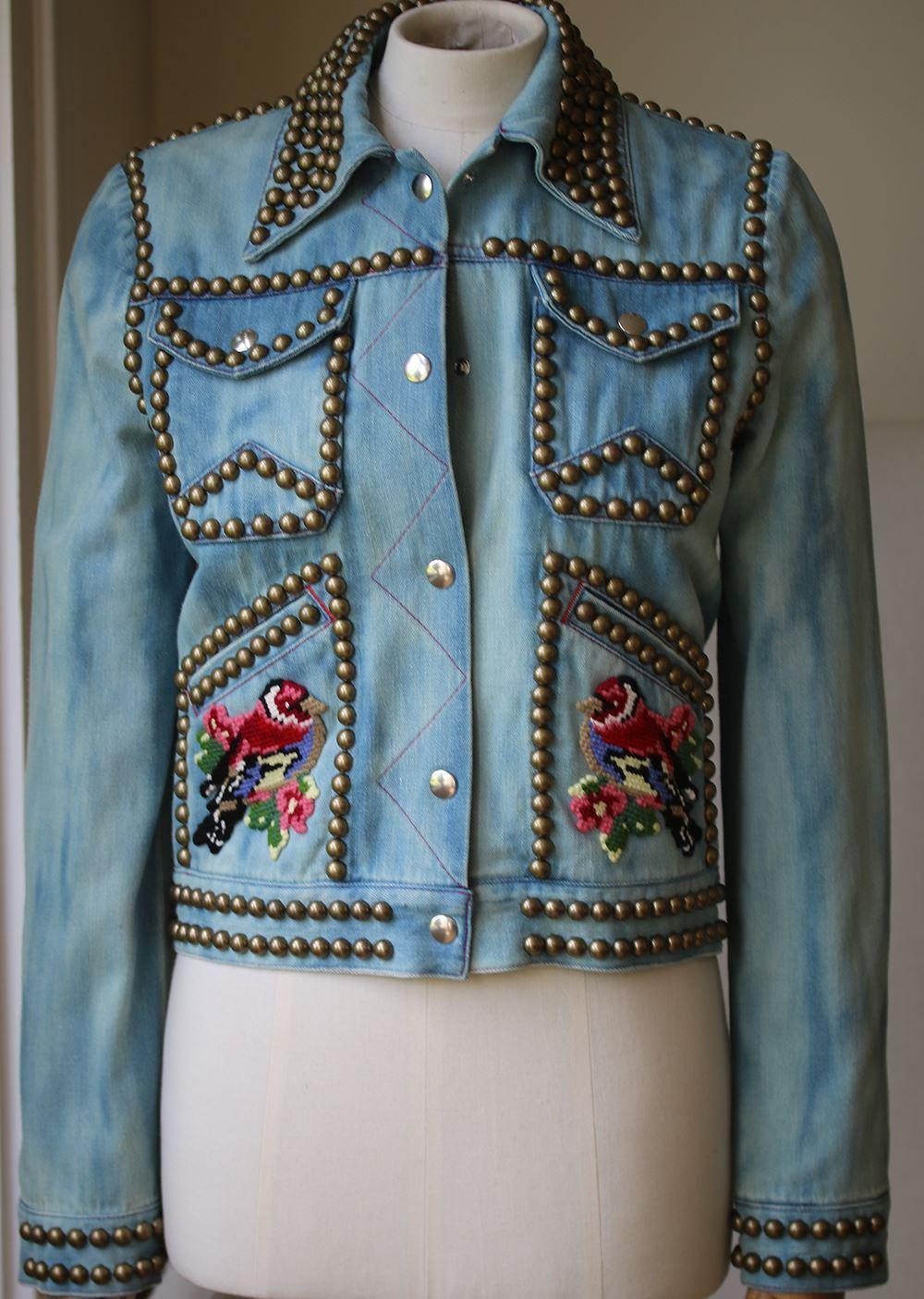 Color Light Blue With Multicolor Details. Pointed Collar. Snap-Buttons Closure Along Front. Two Flap Pockets At Chest, Two Slanted Pockets On Front. Embroidered Patches On Front. Lined. 100% Cotton.

Size: IT 38 (UK 6, US 2, FR 34)

Condition: As