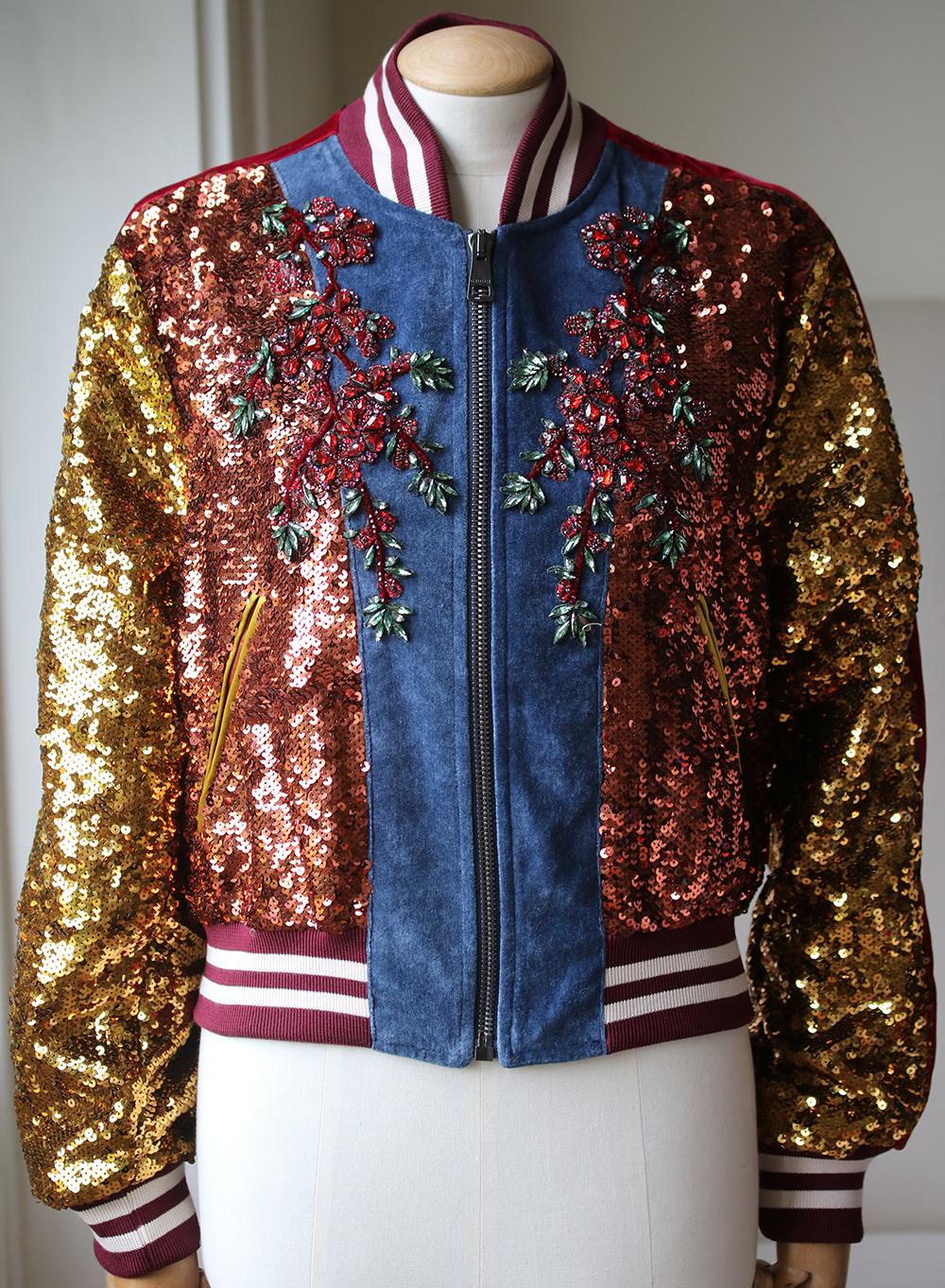 In all-over sequin with washed velvet and knitted trim, this bomber mixes unexpected fabrics and colors that is inline with the current collection. The sequin Angry Cat is an inspired motif introduced for Pre-Fall 2017 and is combined with the