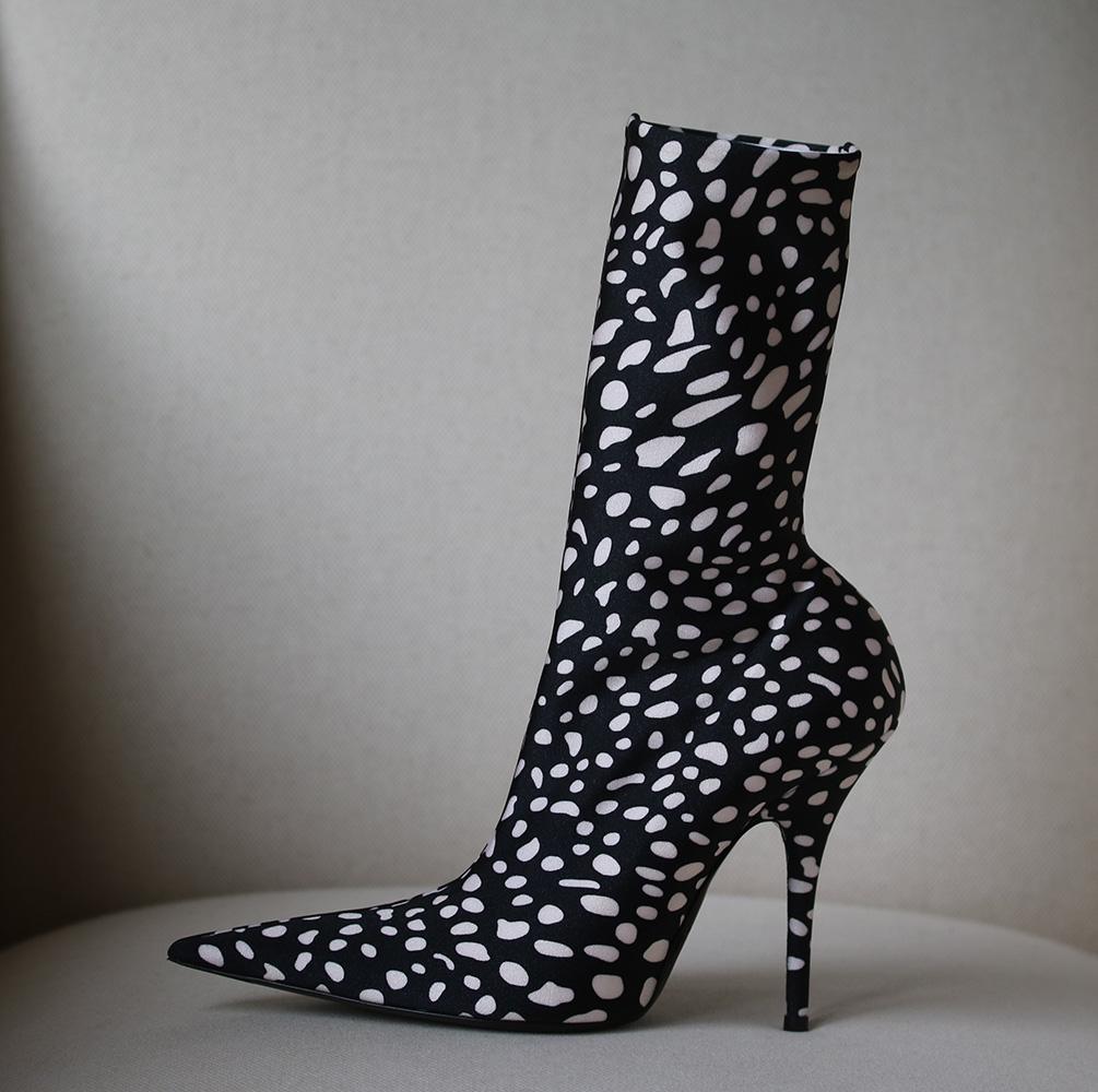 If any fashion influencer made a list of this season's coolest ankle boots, Balenciaga's 'Knife' pair would likely top it. Part of a collection designed just for us, this version is made from black and off-white dot-print spandex woven with enough