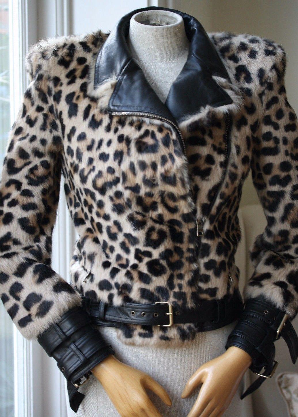 Get noticed in this sumptuous leopard-laden fur jacket from Balmain - Leather spread collar, long sleeves with leather cuffs and elbow patches, asymmetric zip closure, leather waist belt with back waist panel. Fitted. Comes up small.

Size: FR 36