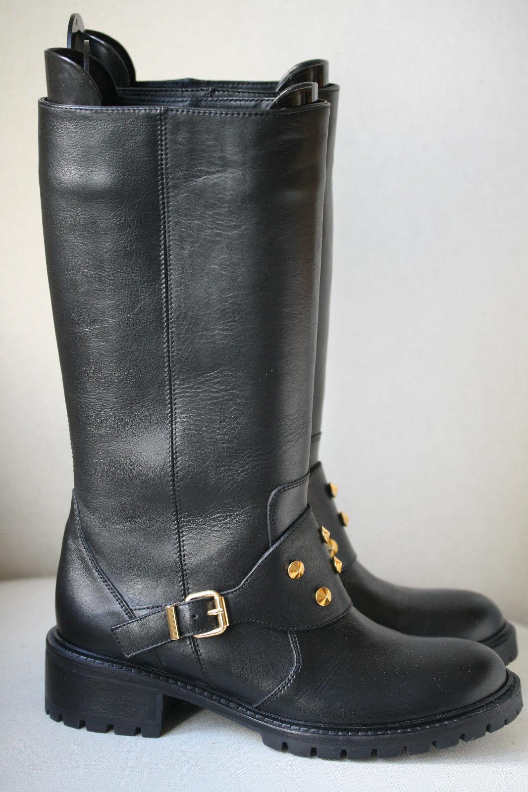 Black leather biker boots with gold hardware with a heel that measures approximately 40mm/ 1.5 inches. Fendi boots have studs at the front, a round toe, a buckle at the side and simply pull on.

Size: EU 37 (UK 4, US 7)

Condition: New without box. 