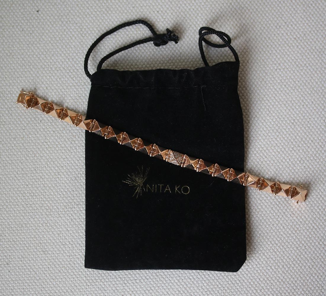 Contemporary jewellery designer, Anita Ko designs pieces for the modern woman, on the go. This small diamond spike bracelet is a striking stand-out. Expertly crafted from 14kt rose gold it features pyramid studs with a pave 0.36 ct diamond