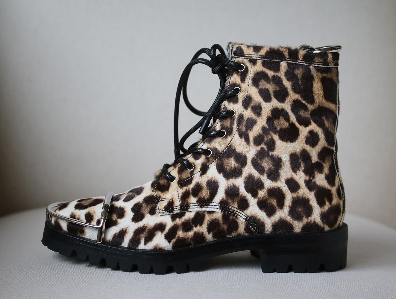 Alexander Wang is a huge fan of punk rock – the sub-culture is reflected in so many of his designs, including these 'Lyndon' combat boots. Made from leopard-print calf hair and grounded with chunky rubber lug soles, this pair is accented with