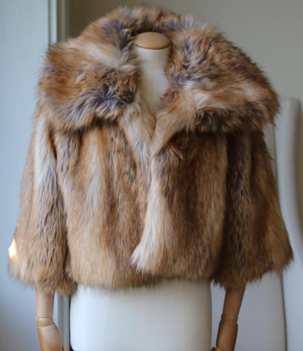 55% acrylic , 23% poly , 22% modacrylic. Made in USA. Hook and bar front closures. Side slit pockets. Faux fur.

Size: XSmall (UK 6, US 2, FR 34, IT 38)

Condition: As new condition, no sign of wear. 