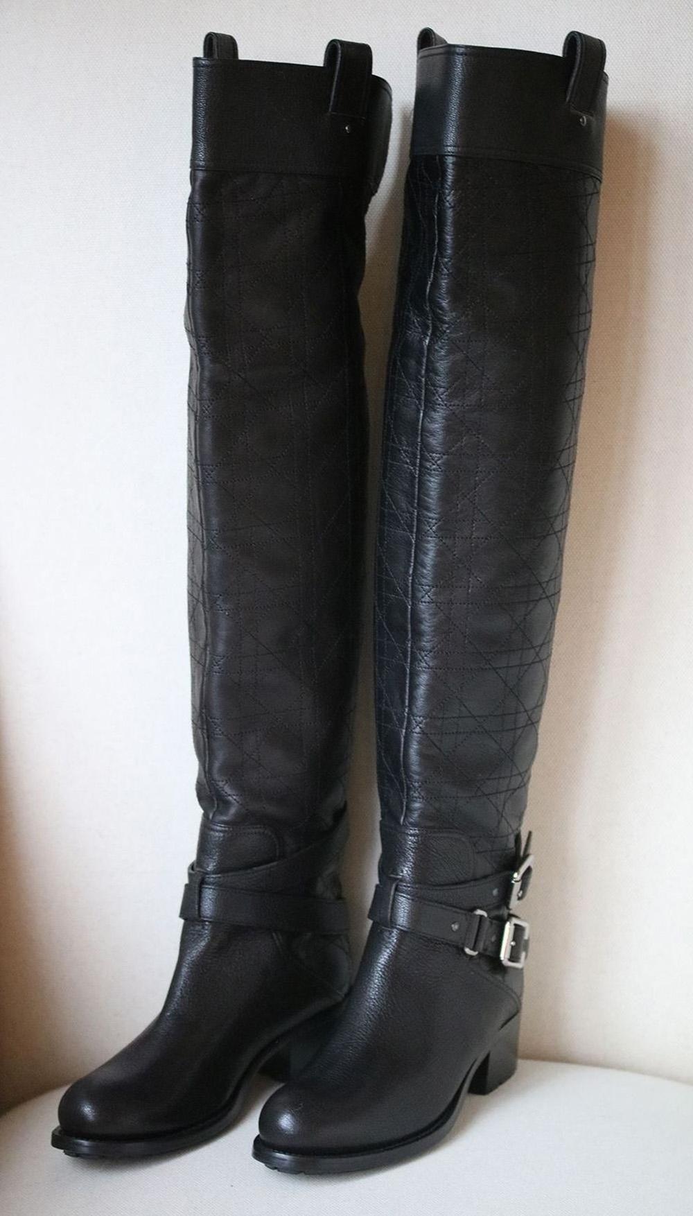 Christian Dior black leather quilted strappy buckled biker boots. Over-the-knee. Buckle detail. Slip on. Rubber soles. 

Size: EU 37.5 (UK 4.5, US 7.5)

Condition: New without box. 