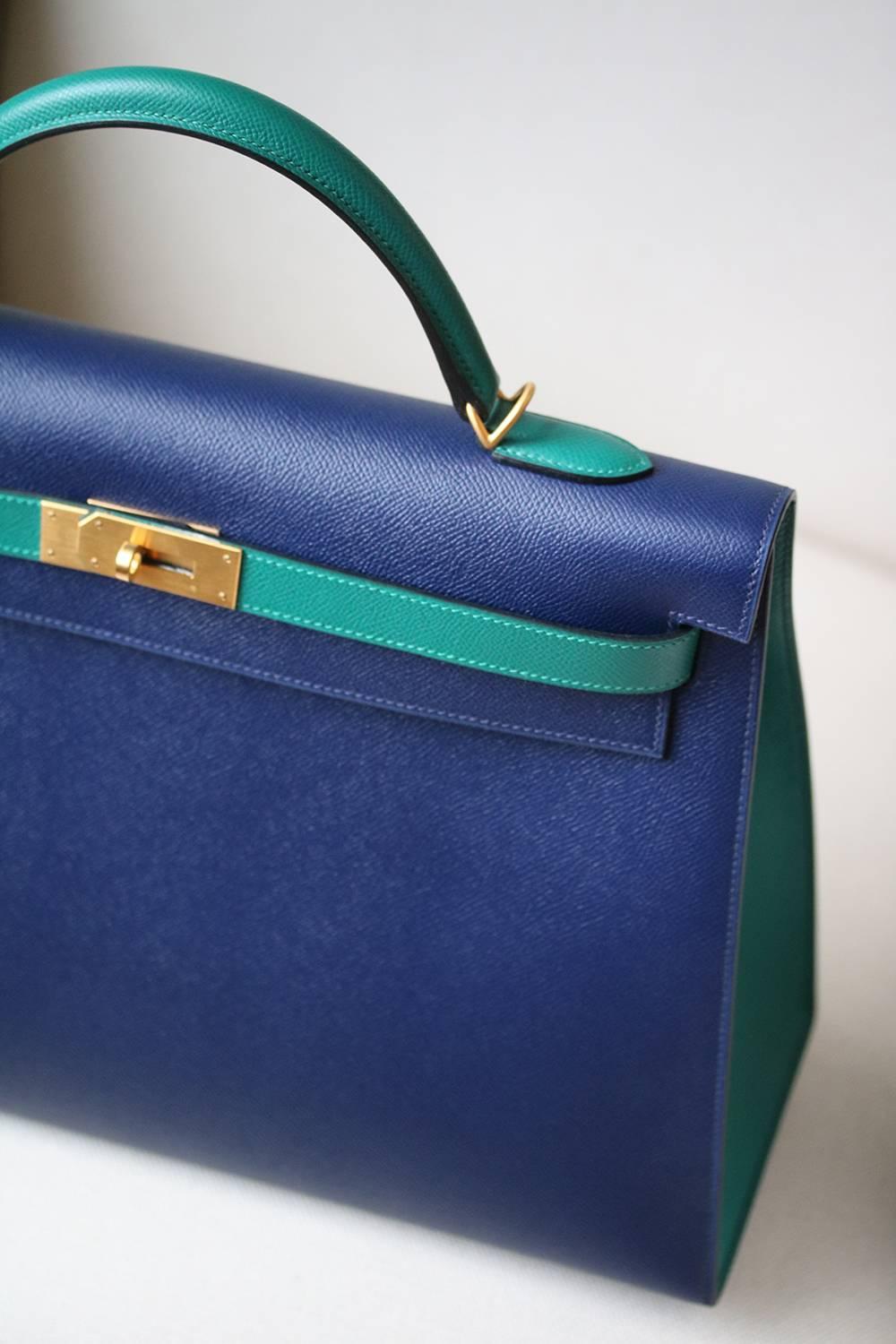 Hermès 40cm Bi-colour Kelly in bi-colour green and blue with brushed gold hardware. Luxuriously rich Hermès blue and green colour with tonal top stitching.

Year: Date stamp is a T in a square - 2015 production.

Condition: This bag is brand-new,