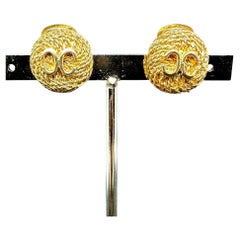 An Iconic Pair of 1960s Chanel Clip-on Button Earrings
