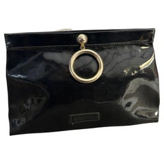 An Iconic 1980s Franco Moschino Blue Plastic and Brass Hand Bag