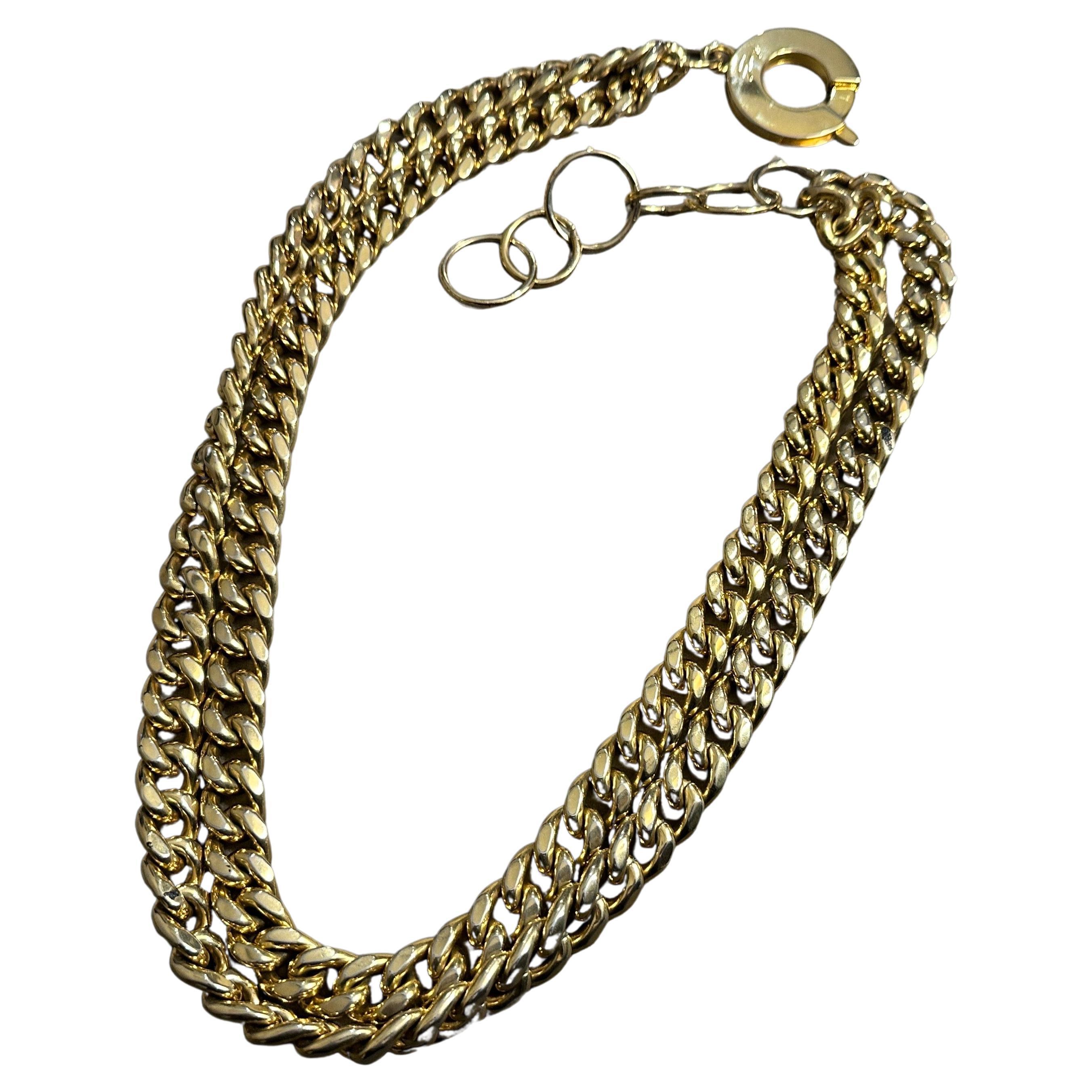 Una splendida cintura o collana a catena in ottone degli anni '80 di Genny - un pezzo versatile e di grande effetto
Fai una dichiarazione di moda audace con questa squisita catena vintage degli anni '80, disegnata dal famoso marchio di lusso