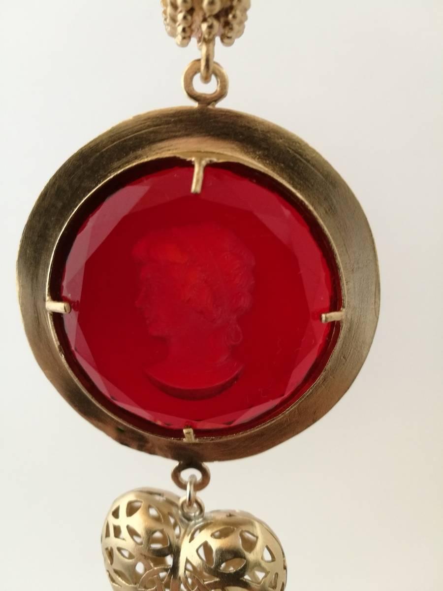 Bronze pendant with red coloured and engraved Murano Glass inserts and a Bronze Heart. All Murano Glass inserts have been cut by an expert craftman.  Pendant is made in Florence by goldsmith craftman and marked Patrizia Daliana, a famous italian