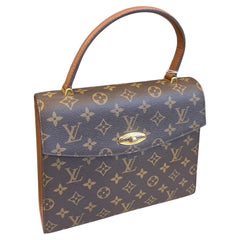 A 1994 Vintage Louis Vuitton Monogram Malesherbes Hand-Bag