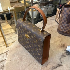 A 1994 Vintage Louis Vuitton Monogram Malesherbes Hand-Bag
