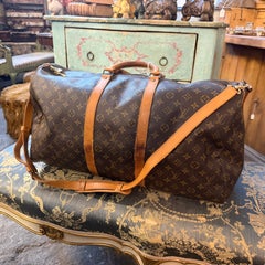 A 1989 Iconic Brown Monogram Canvas Keepall 55 Bandoulière by Louis Vuitton