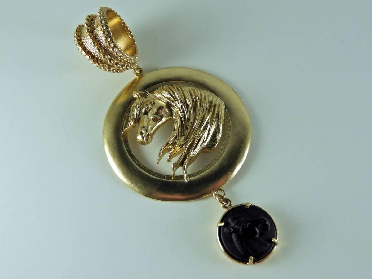 bronze necklace with an horse pendant and a black glass paste pair of earrings made in italy by Patrizia Daliana from the new Horses collection
