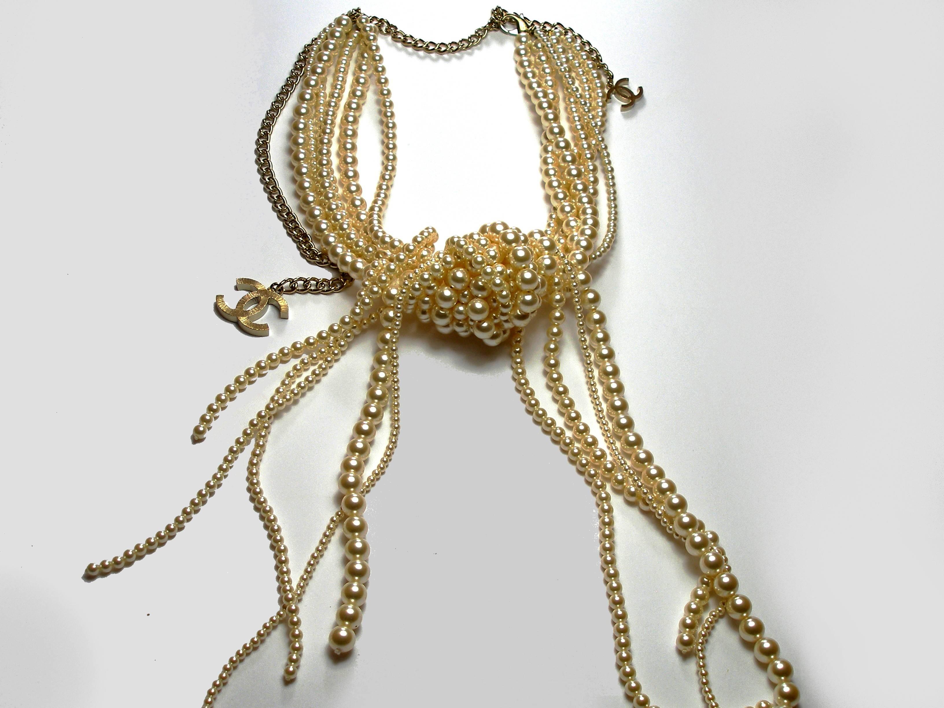 Fanstastic !
Chanel Pearl Multi Row necklace
Fall/Winter 2014-15 RUNWAY COLLECTION
Stunning and Iconic!! 
One of a kind!  
Retailed $6500
Length: 50 cm
Necklace adjustable from 38 to 55 cm
Chanel 14 C signed on the Clasp
Its comes with Chanel box