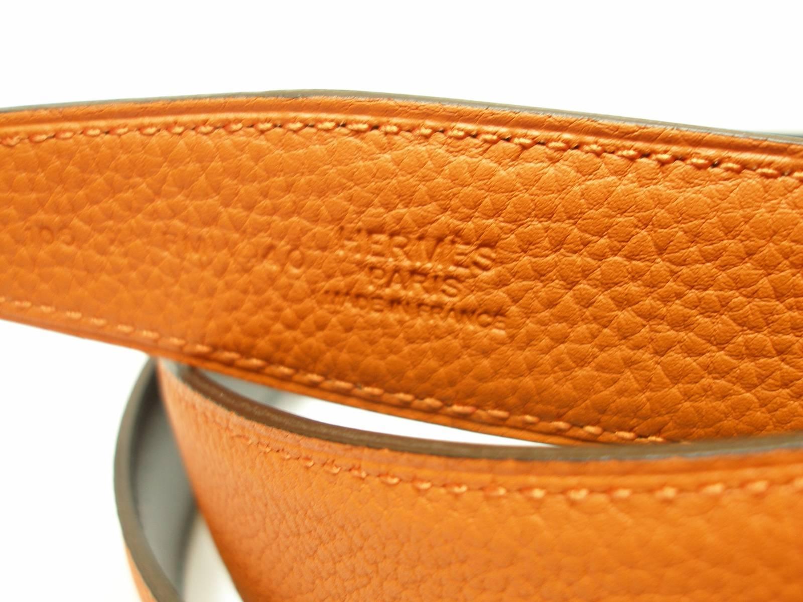 CLASSIQUE and INTEMPOREL 
Hermès 32mm Kilt Belt in classic with Idem Buckle Shiny Palladium + Reversible
Strap in Black Box Leather / Potiron Togo Leather 
Size : 105 cm 
For a waist size of  3 possibilities  :
1 /  102.5 cm or 40.35 " 
2/  105