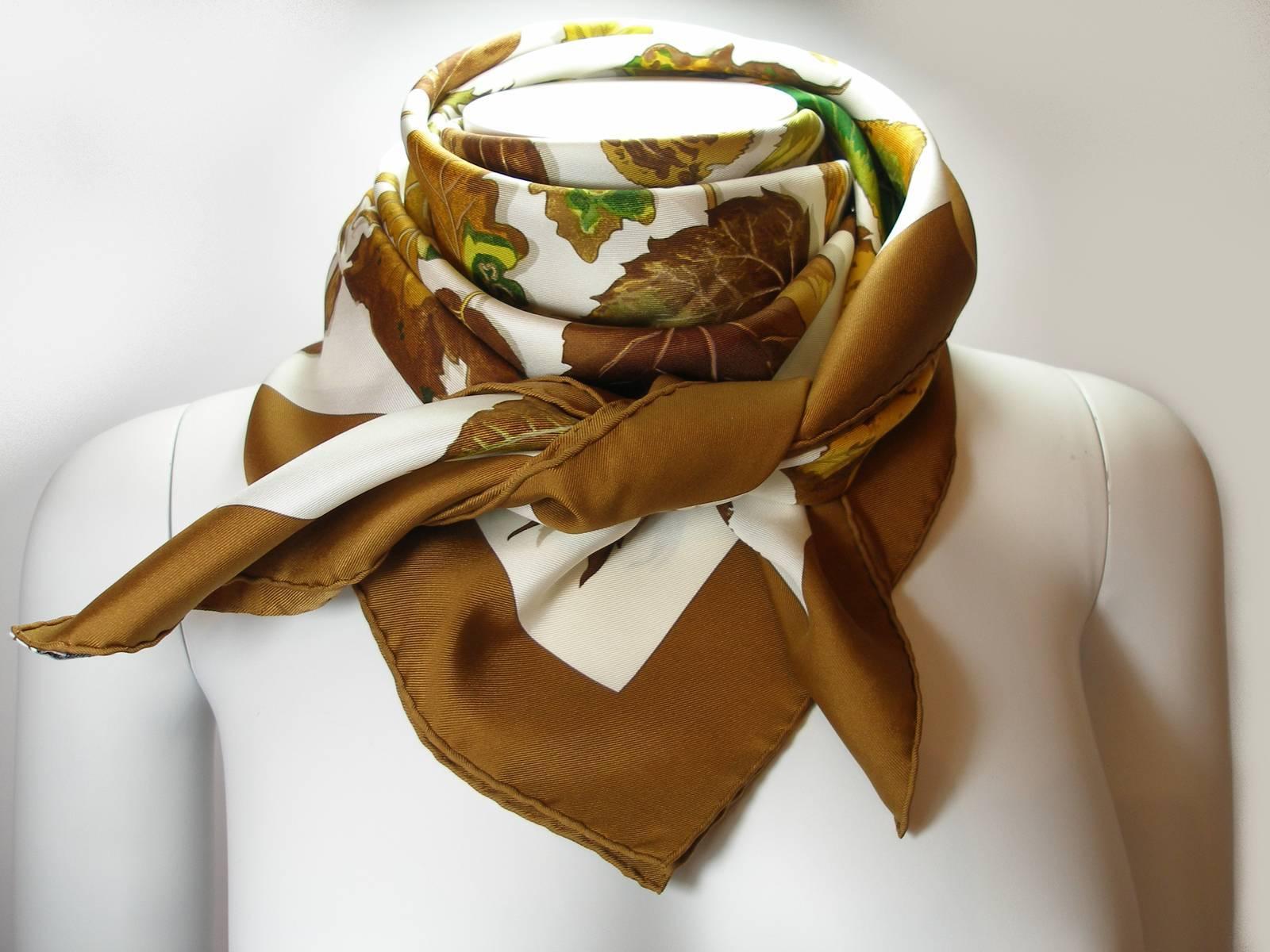 Hermès Tourbillon scarf 
This scarf was designed in 1968 by Christiane Vauzelles
Broen/multicolor on cream background 
Model : Tourbillon
Size : 90 x 90 cm 
100 % silk 
Color : Multicolor 
Tags and copyright are intacts 
It's comes with Hermès
