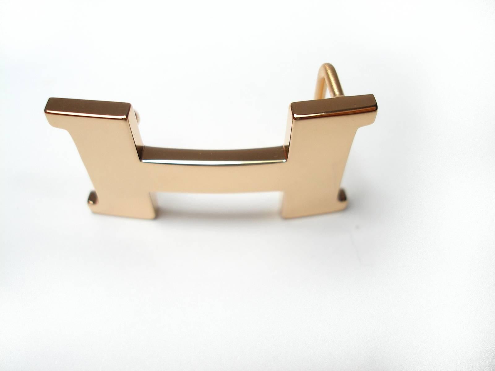 Hermès H Mini Constance 
Slightly pink gold plated 
Stamped Hermès and  numbered 
Made in Switzerland
100 % AUTHENTIC
Please note : 
the front is in excellent condition 
the back of this buckle shows traces  / Used 
Please take a good look at the