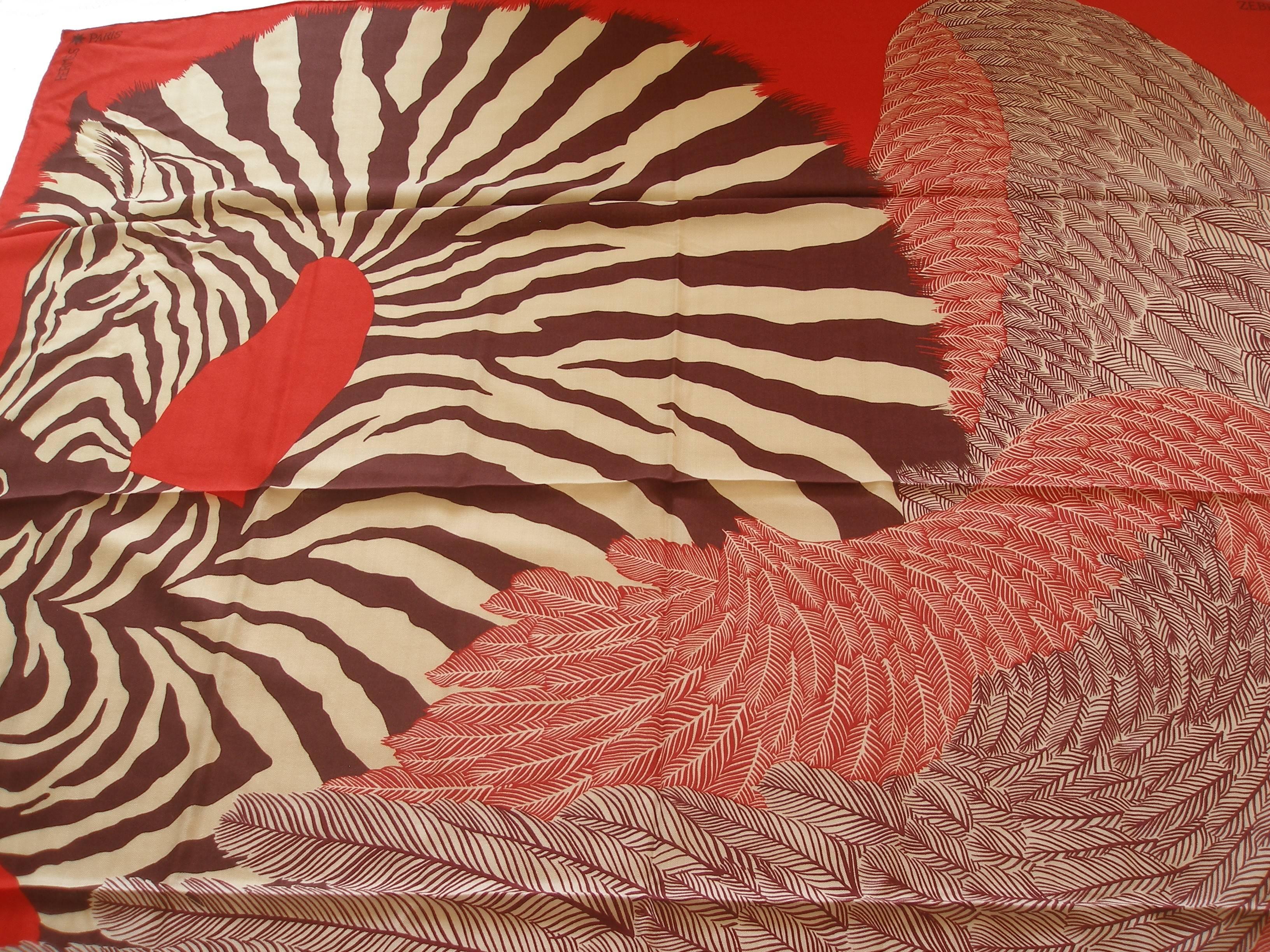 Brand new and never worn
Hermes Zebra Pegasus Shawl
Designed by Alice Shirley
Size 140 cm x 140 cm 
Color : Vermillion
EXTREMELY RARE and SOLD OUT EVERYWHERE
Sorry no Box , it's comes with Hermès shopping bag & ribbon .