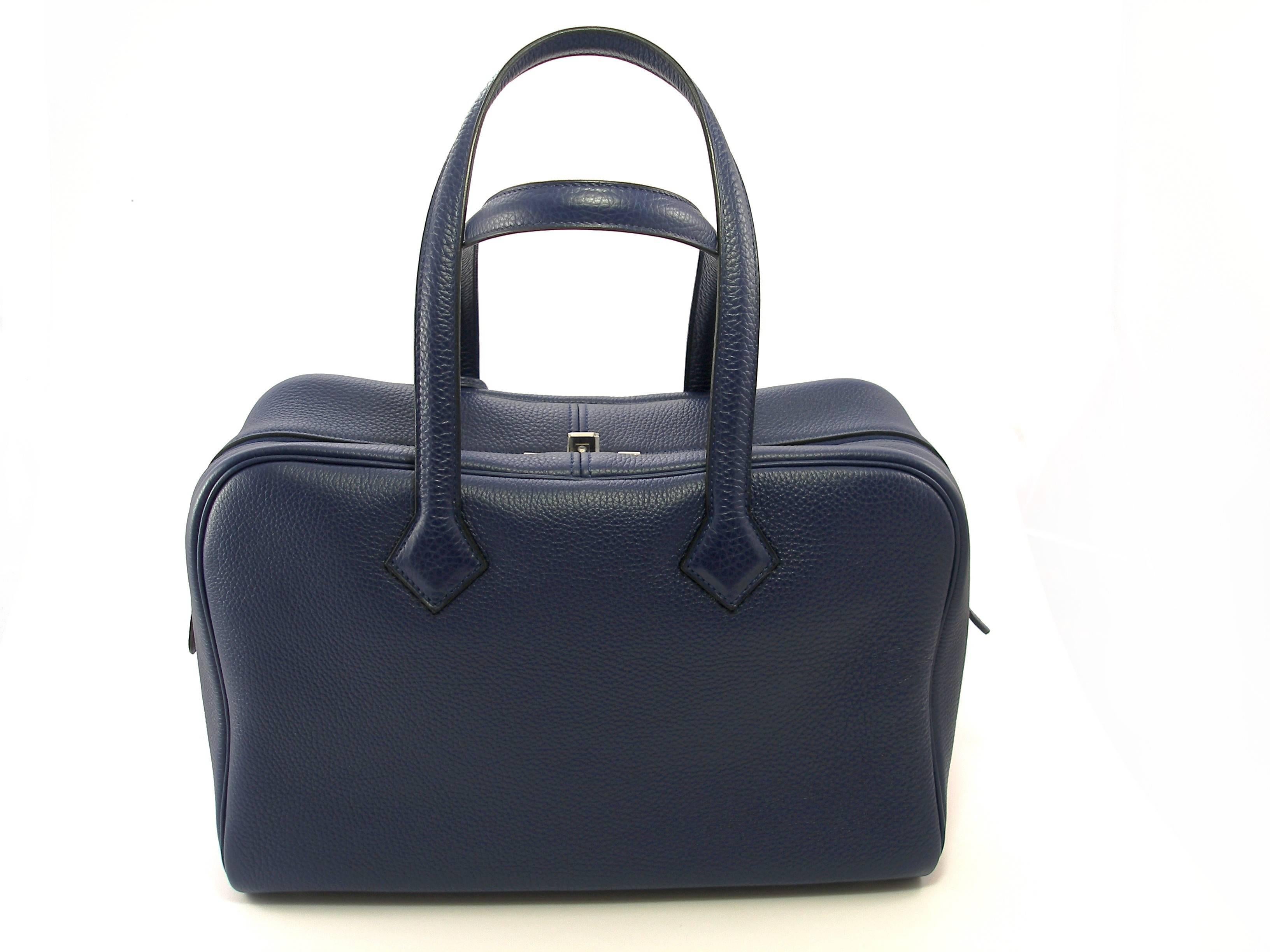 Impossible to find in this color BLEU SAPHIR 
Genuine 35cm Hermès Victoria II bag.  Featured in SAPHIR  Blue Clemence leather with palladium hardware.  Clemence leather is for those who prefers a less structured, slouchy feel.  The blind stamp