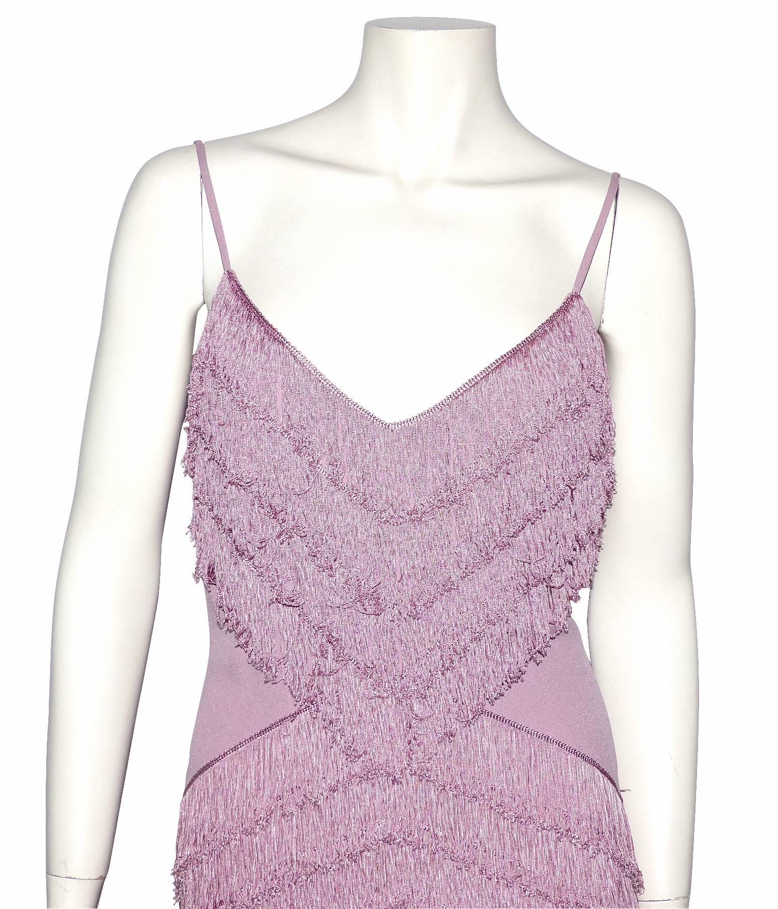 Very beautiful Dior strapless dress in fully fringed parma color.
A slightly curved shape and marked at the waist by a solid stretch mesh.
Zipper on the side.
Satin silk lining.
Composition: 69% acetate, 31% viscose
Excellent condition
Overall