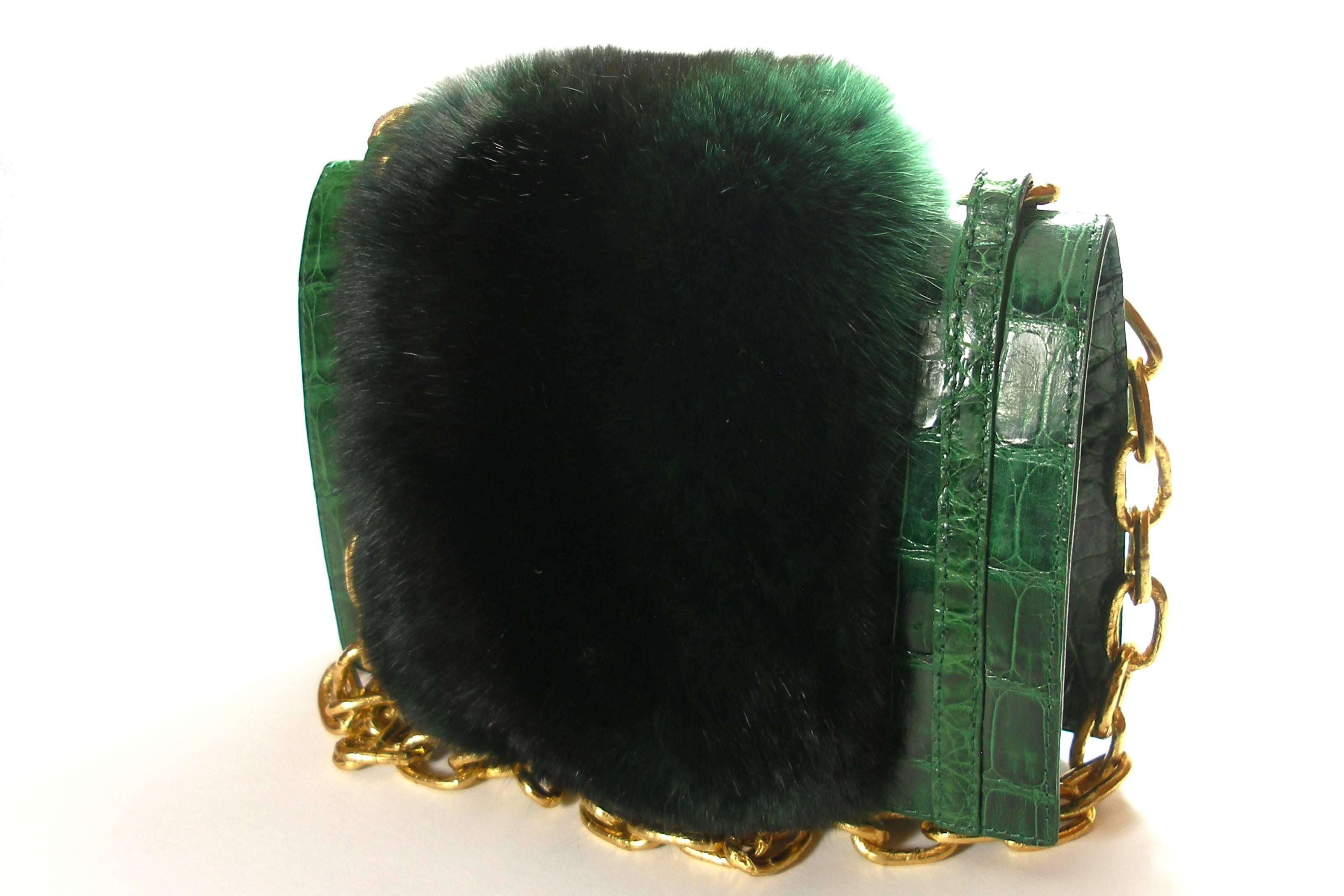 ONLY IN PRE ORDER / SOLD OUT EVERY WHERE
MAGNIFIC !
MINI shoulder bag in crocodile Leather and mink fur 
EXTRAORDINAIRE COLOR : green 
Size : MINI  
Dimensions : 16 x 11 x 4 cm 
Strap : 58 cm ( shoulder bag ) 
INTERNATIONALS BUYERS CUSTOMS DUTIES