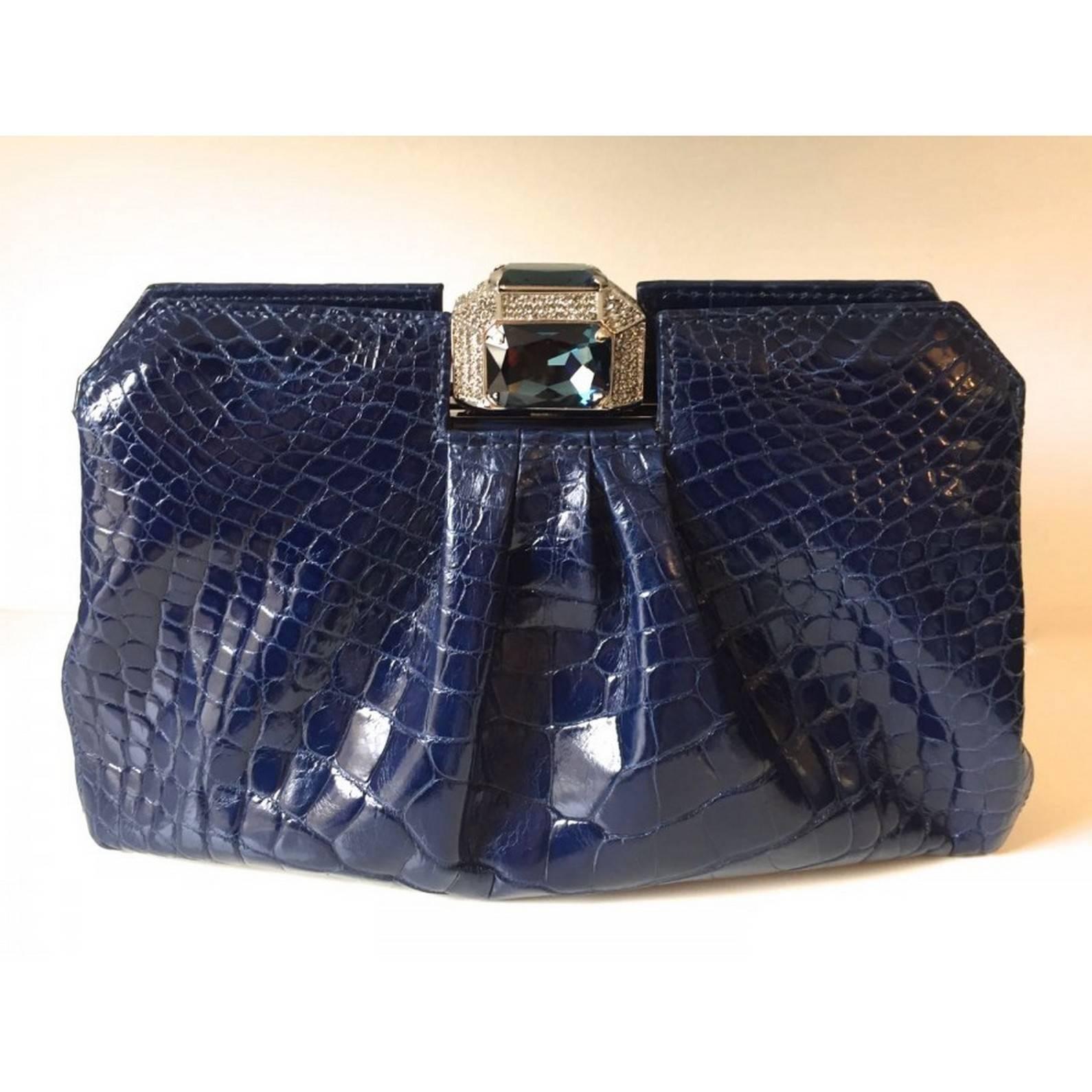 MAGNIFIC Clutch or Evening Bag Valentino 
Alligator blue 
Métal silver
Crystals Swarovski
 Amovible métal strap 
 Dimensions : 25 cm x 16 cm x 8 cm
Sorry no box , no dust bag 
INTERNATIONALS BUYERS CUSTOMS DUTIES AND TAXES ARE INCLUDED
Thank you for