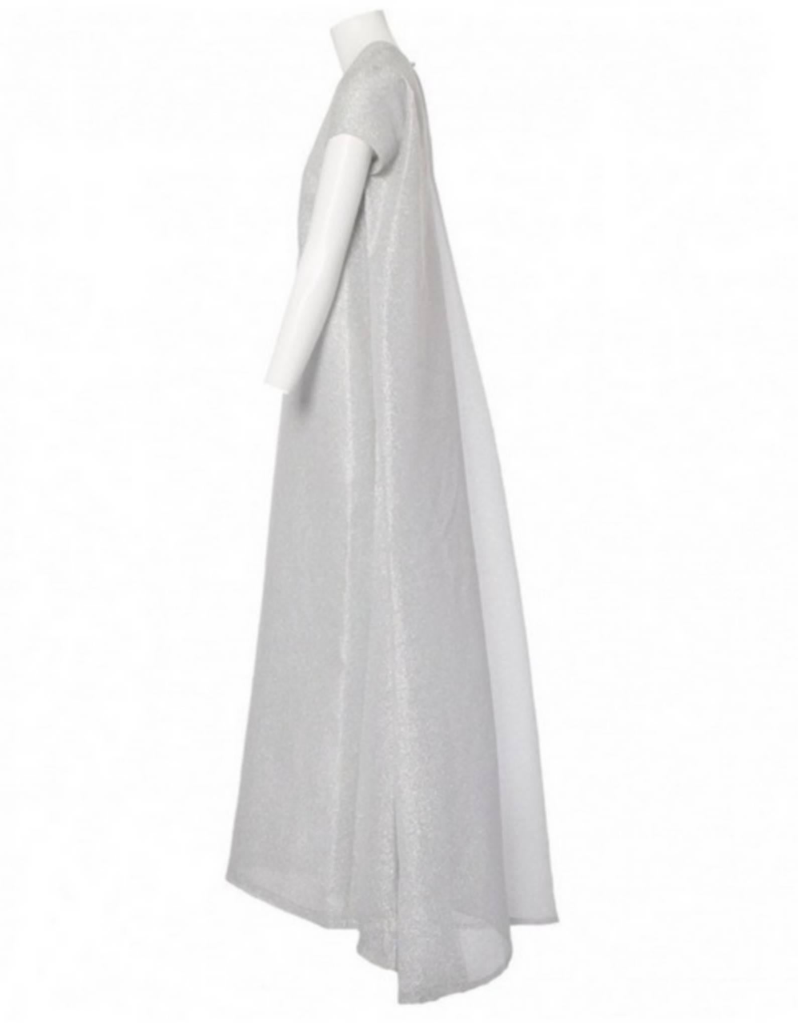 The toast of England’s upper crust, the designer delivers refined feminine frocks that render the modern woman perfectly posh. Destined to make a shining statement, this silver Emilia Wickstead gown shines for its breathtaking silhouette, with a