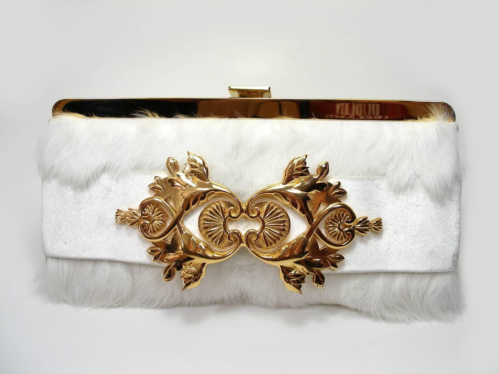 Wonderful Balmain Clutch Baroque Style
Authentic fur 
White and gold hardware
Signature inside
Please note : NO strap for this clutch. You can adapt a shoulder strap.
Dimensions : 28 x 14 x 5 cm  approximate 
No dustbag / no box 
